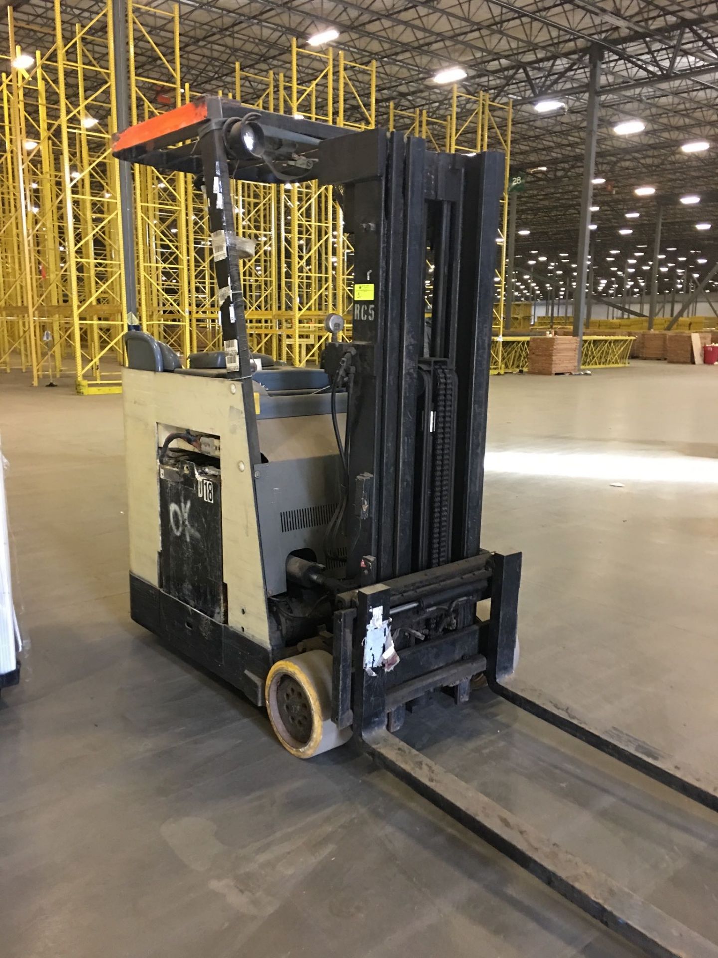 CROWN STAND UP FORKLIFT. Model #: RC3000. S/N: 1A241589. Hours (as of Oct 15, 2018): 10700. Year: