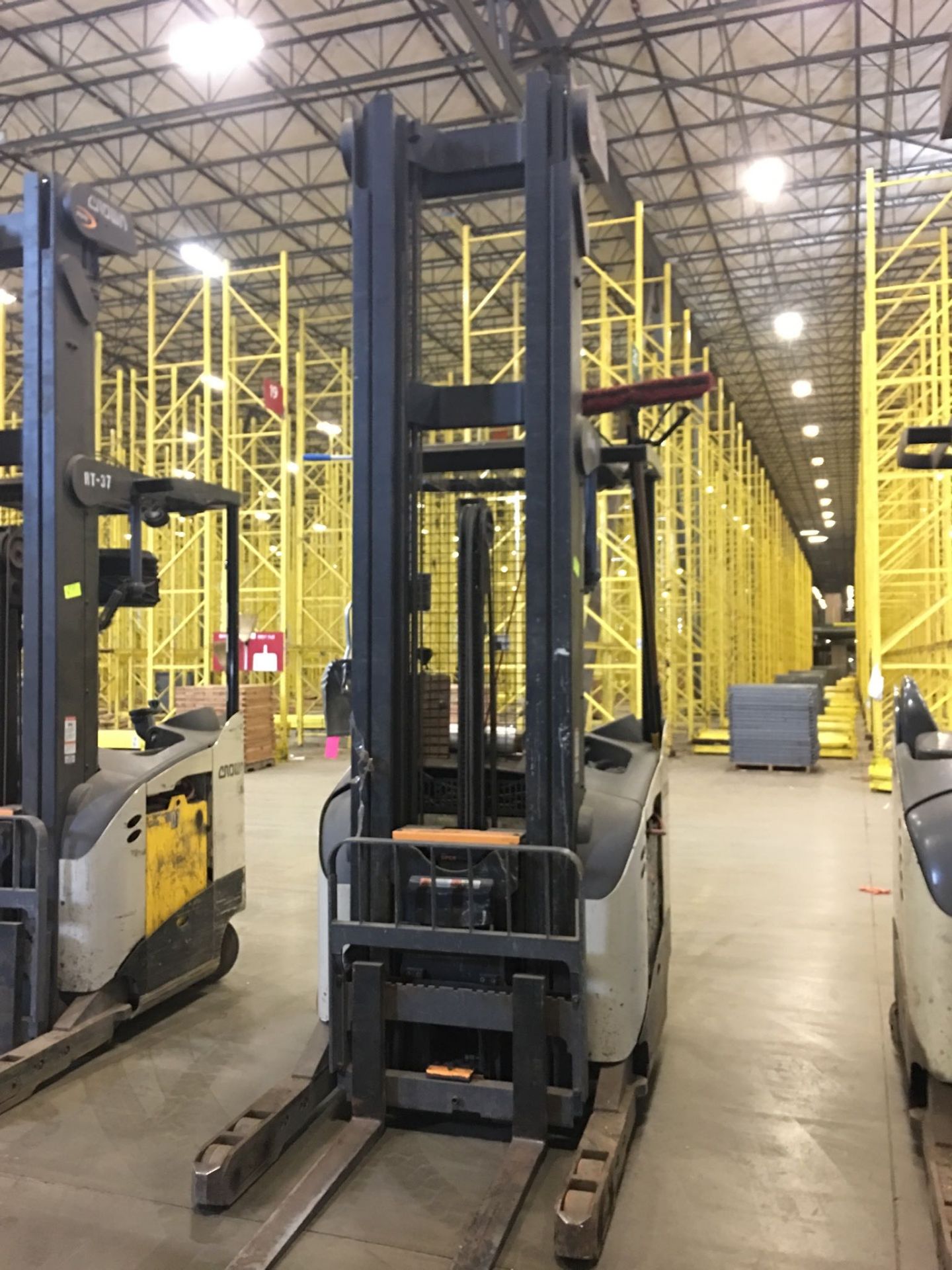 CROWN REACH TRUCK. Model #: RR5700. S/N: 1A460481. Hours (as of Oct 15, 2018): 4329. Year: 2016.