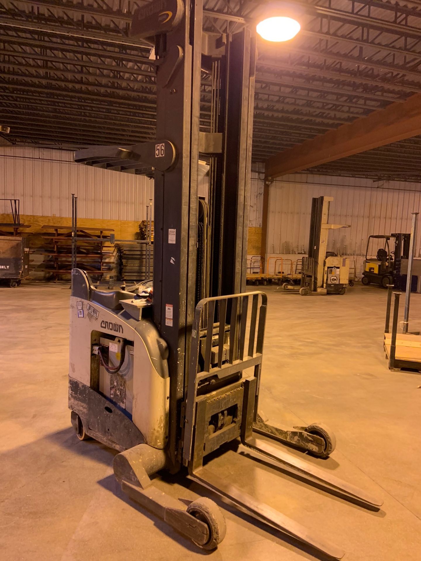 Forklift: Stand Up Electric Forklift. Make: Crown. Model: RR5220-45. S/N: 1A297804. Year: 2005.