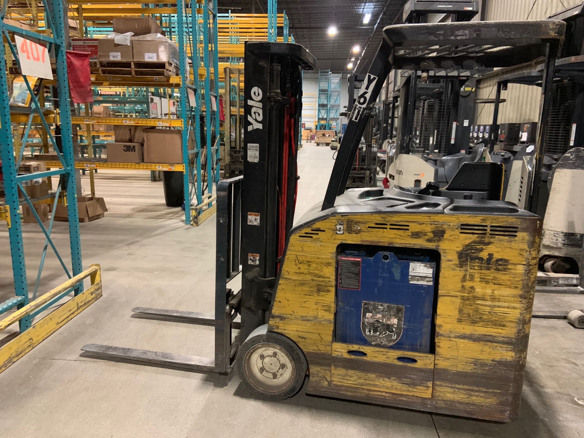 Forklift: Stand Up Electric Forklift. Make: Yale. Model: ESC040FAN36TE082. S/N: A883N02199B. Year: