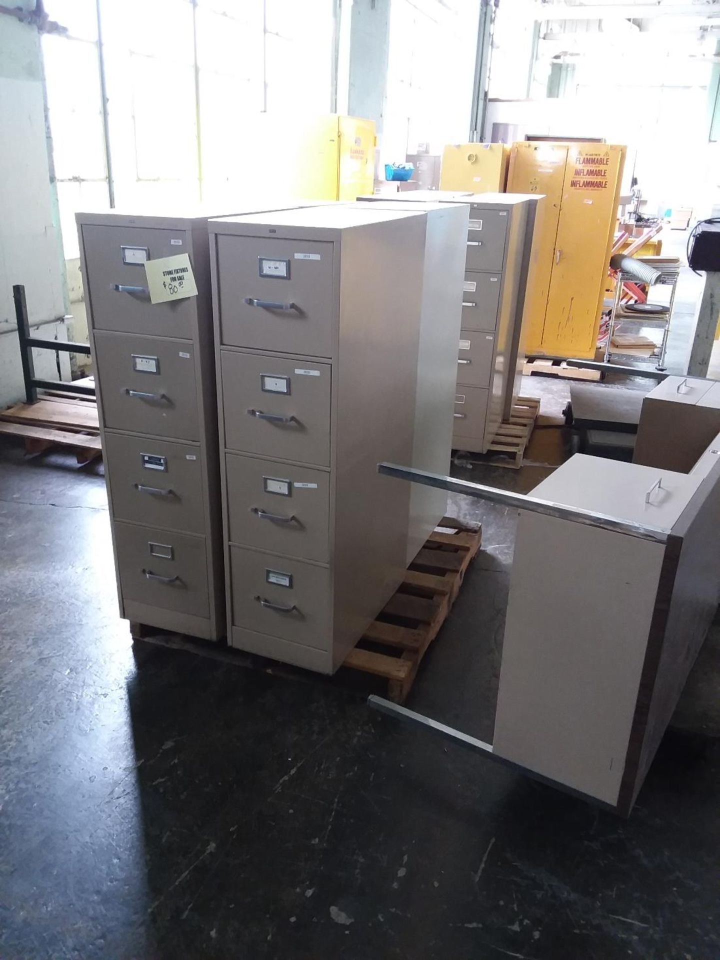 1 lot of office furniture which includes 30 4 drawer metal file cabinets, 18 meta desks, 2 2drawer - Image 4 of 8