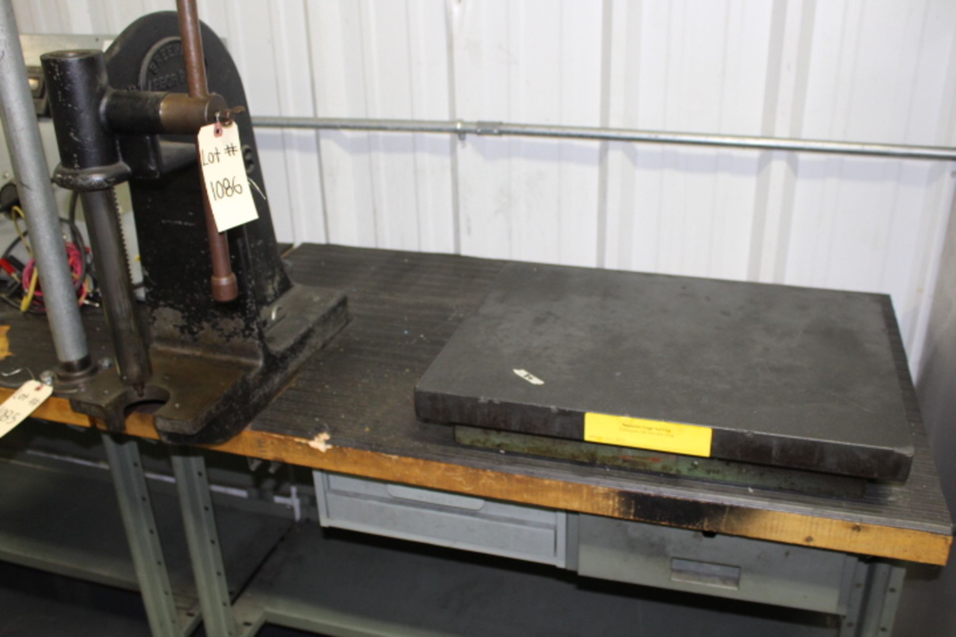 Testing station with arbor press and surface plate