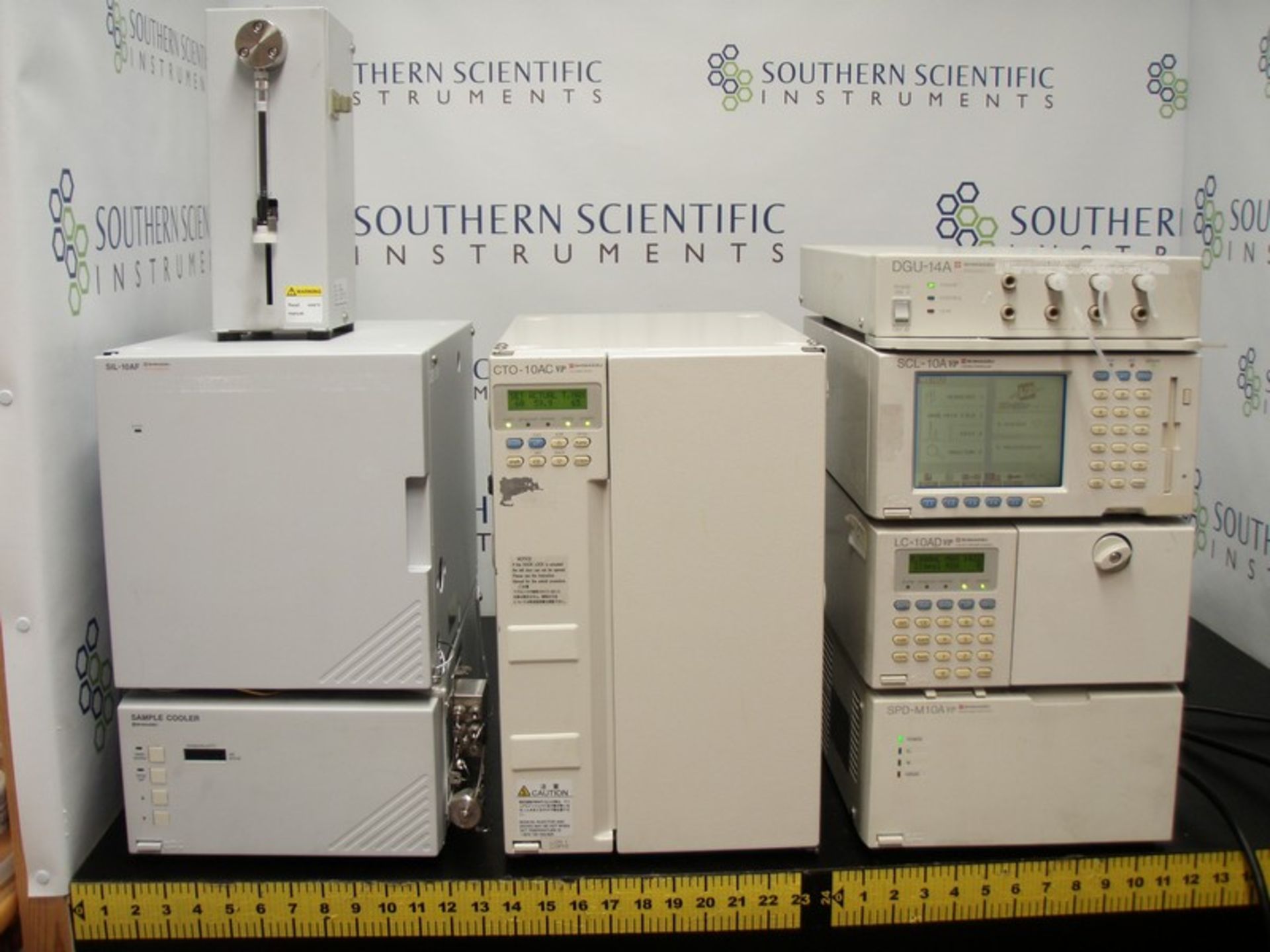 Shimadzu LC-10 HPLC System Containing: CTO-10AC Column Oven, DGU-14A Degasser, SCL-10A System