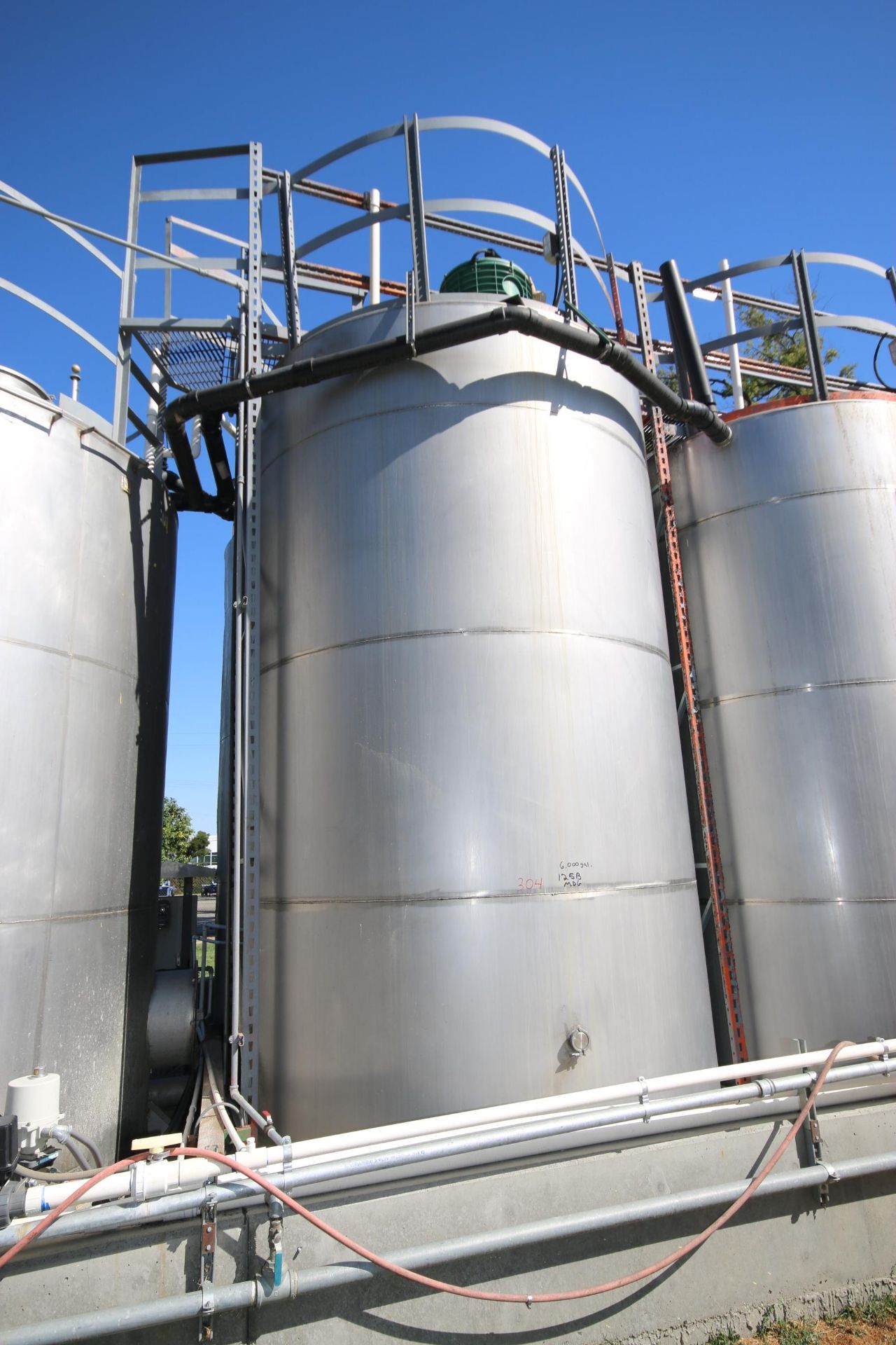 6,000 Gal. S/S Vertical Single Wall Tank, with Associated Piping and Sensors