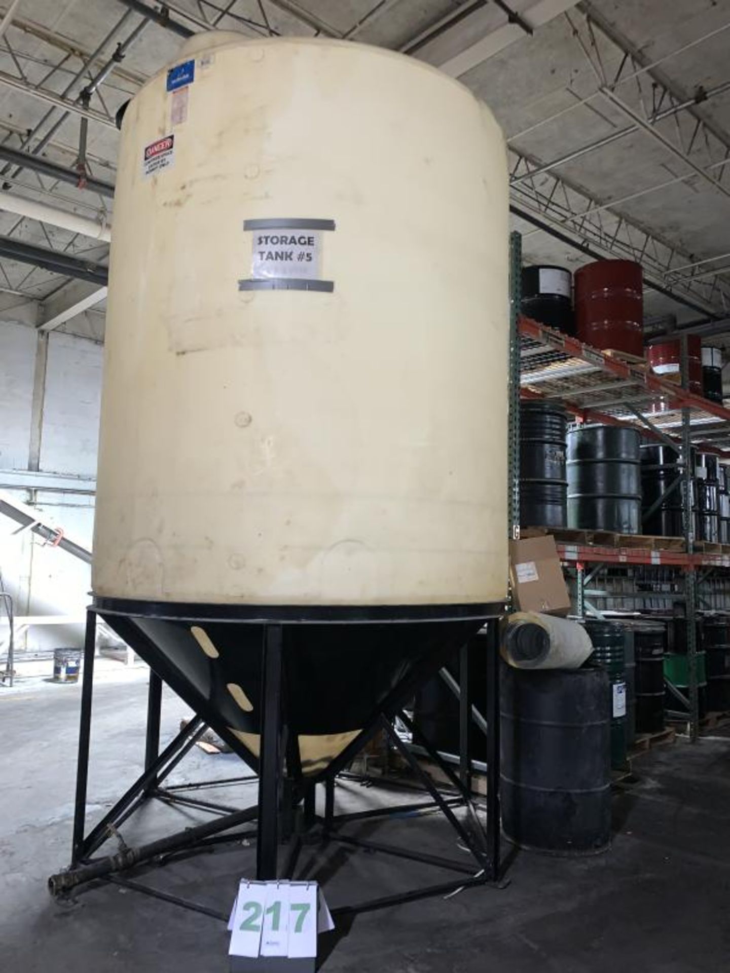 2000-Gallon Poly Storage Tank on Miold Steel Based . $200 Loading Charge;