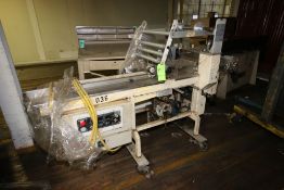 PFM Flow Wrapper, M/N 30, with Infeed Conveyor, Mounted on Portable Frame & Crouch Conveyor/