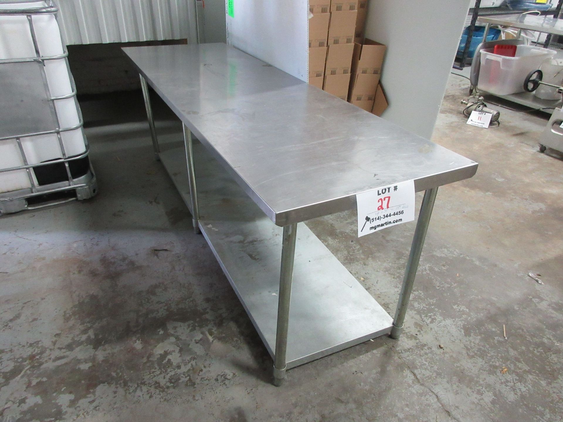 Stainless steel table 8 ft x 30" x 33" high (aprox)