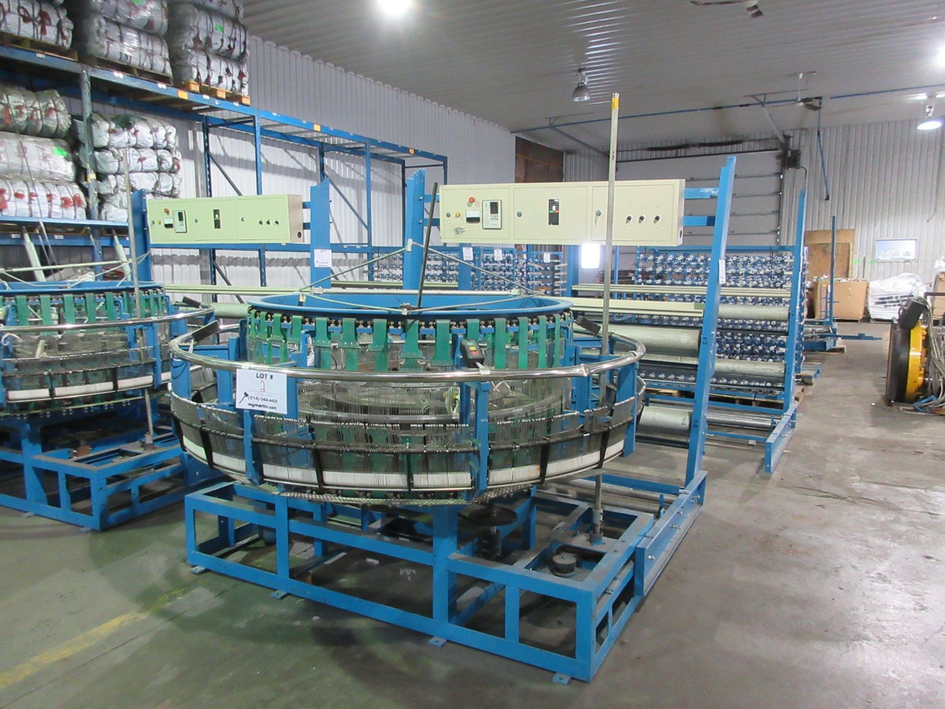 Weaving machine for polypropylene bags w/t spool stands, etc.