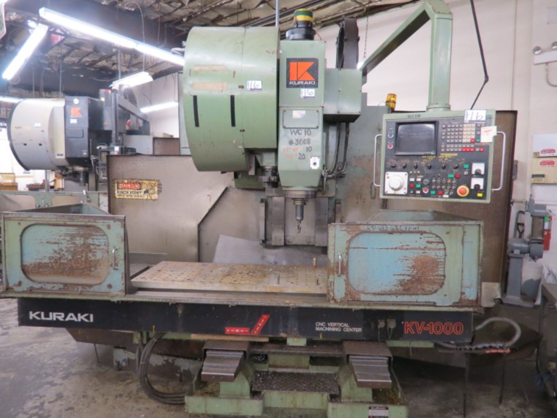 Kuraki KV-1000N VMC, Fanuc 6M, 41” x 24” x 24” travels, 3500 RPM, 24 ATC, BT-50, s/n 11313, New 1982