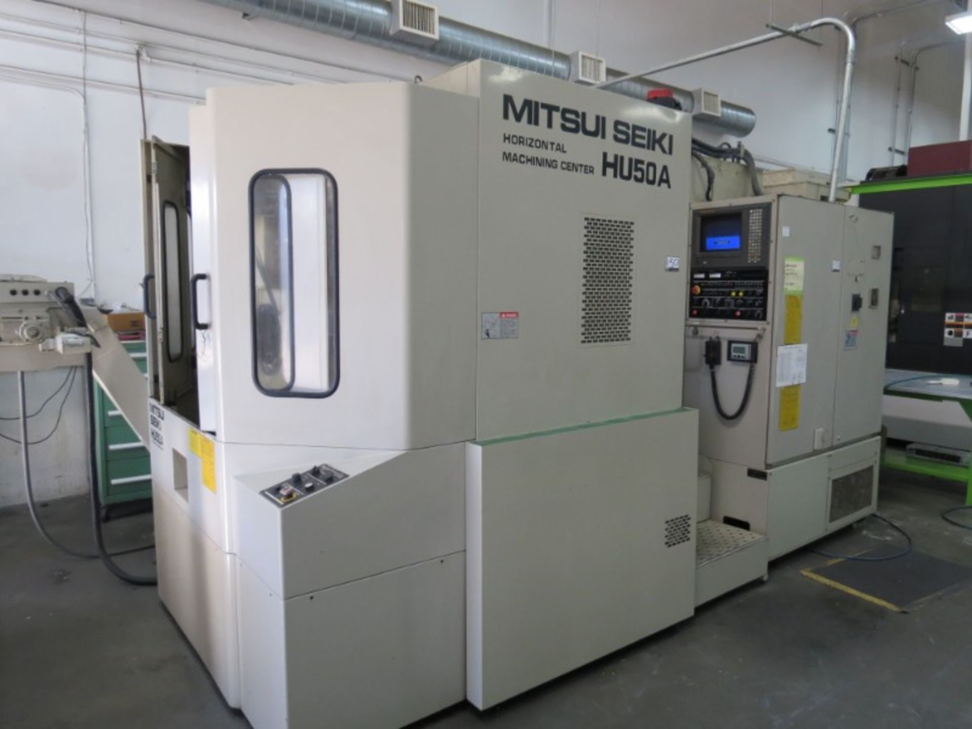 Mitsui Seiki HU-50A, Fanuc 150M, (2) 20”pllts, 12000 RPM, New 1998