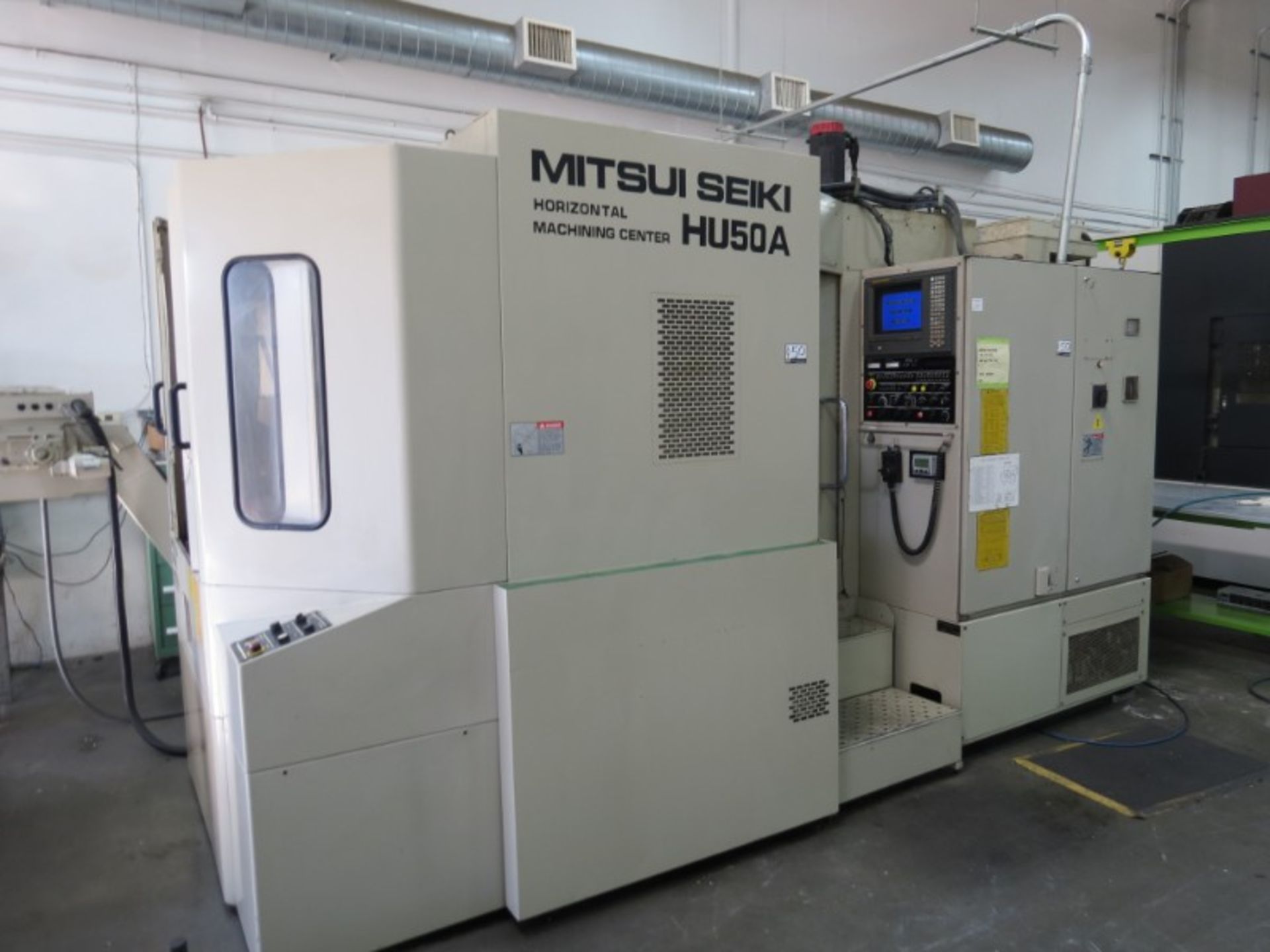 Mitsui Seiki HU-50A, Fanuc 150M, (2) 20”pllts, 12000 RPM, New 1998 - Image 2 of 11