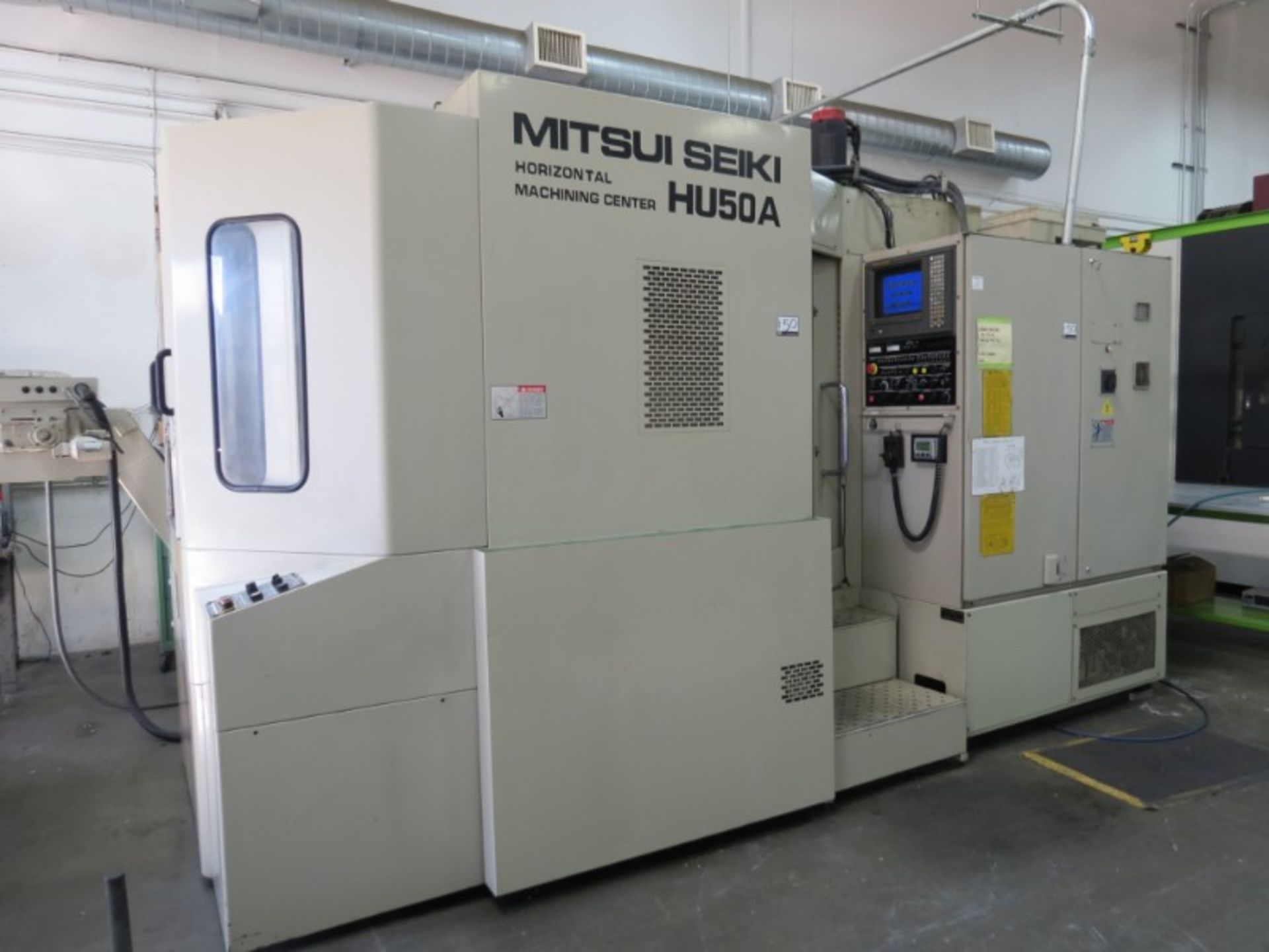 Mitsui Seiki HU-50A, Fanuc 150M, (2) 20”pllts, 12000 RPM, New 1998 - Image 3 of 11