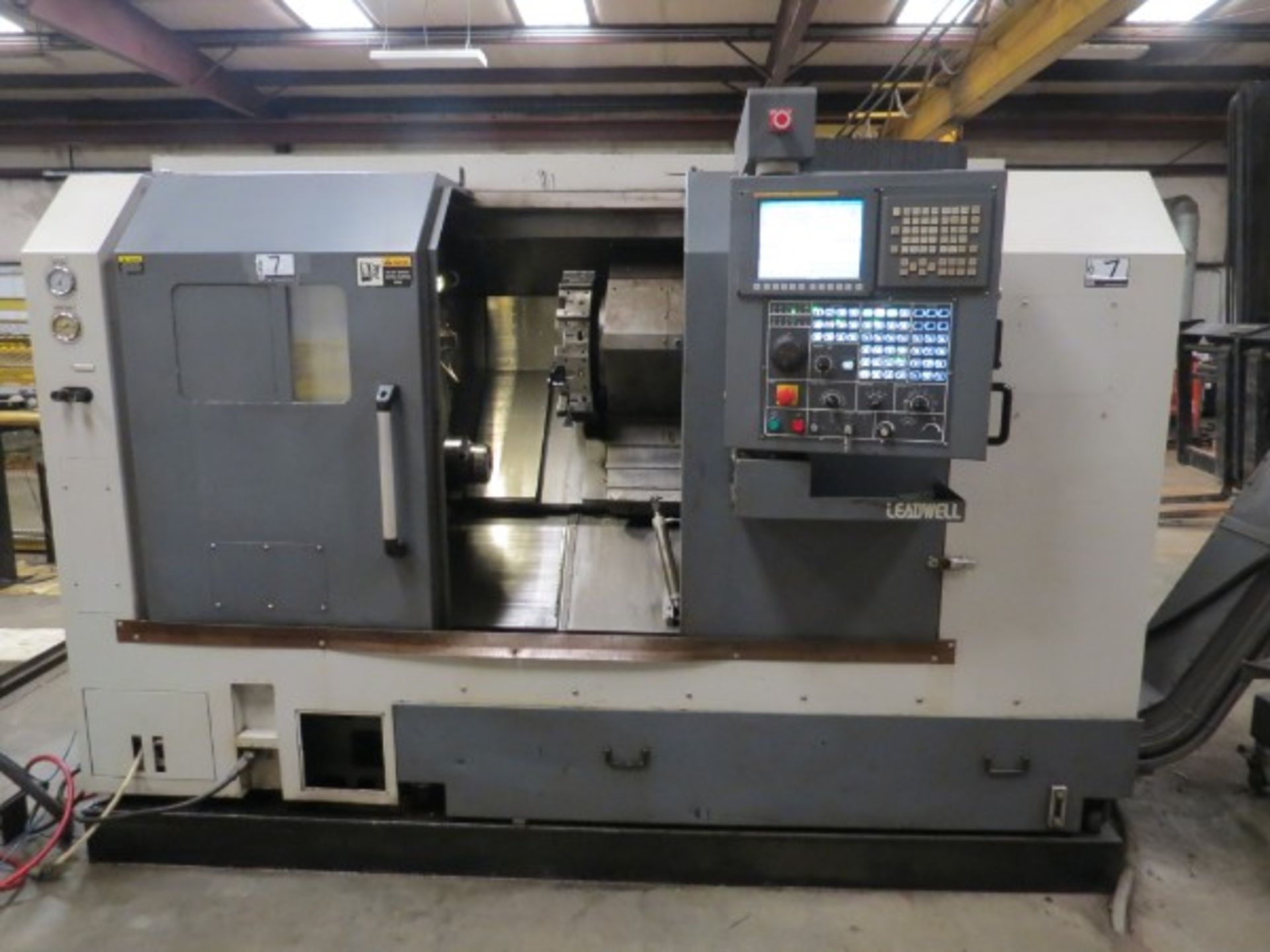 Leadwell T-7 CNC Turning Center Fanuc 0i-TD, M/N T-7 S/N L2TAB0335 New 2012