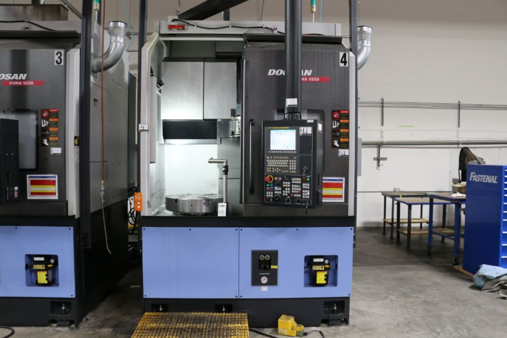 Doosan Puma VT550 CNC Vertical Turning Center, Fanuc I control, 24" Chuck, 12 Position Turret,