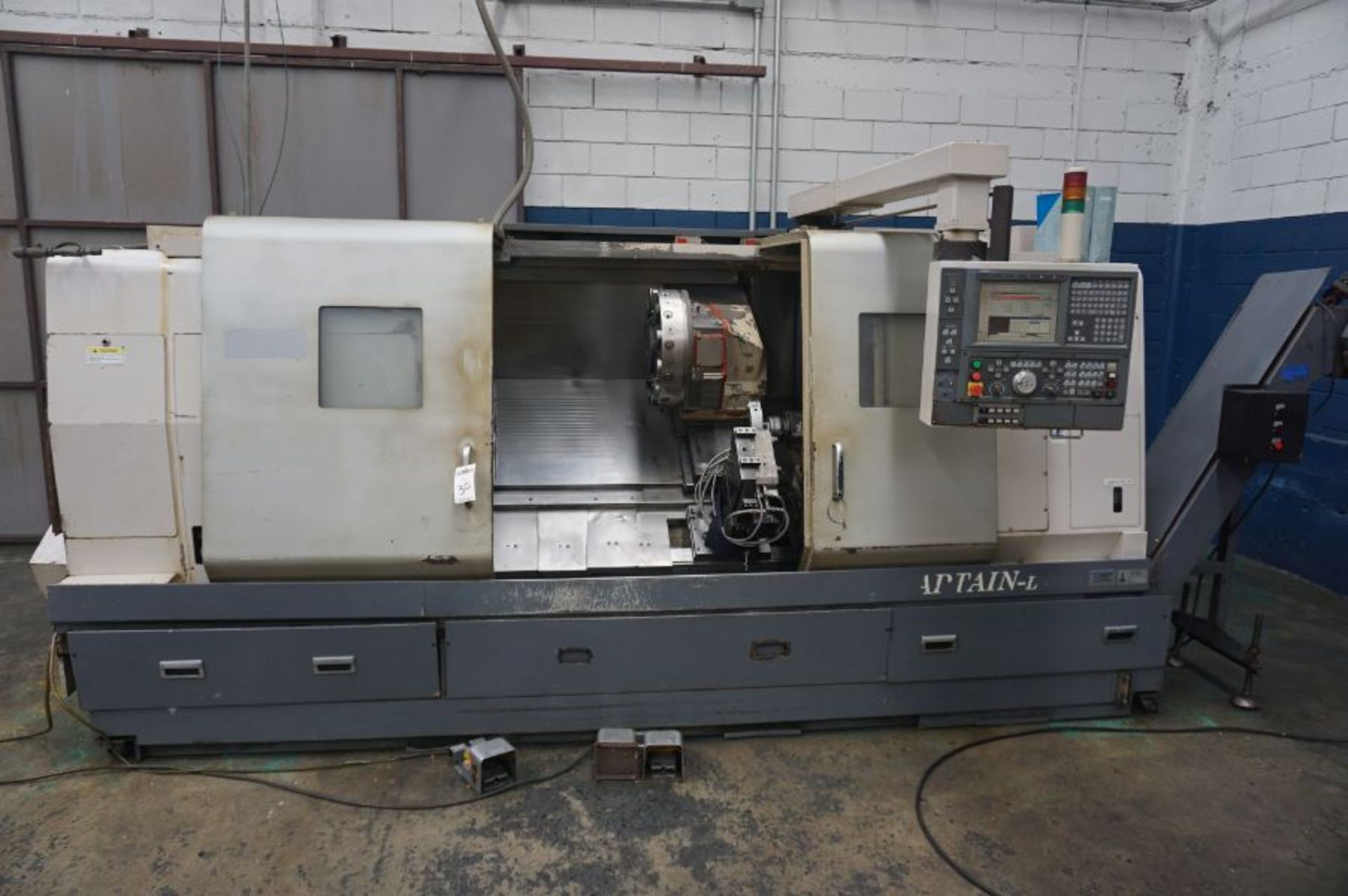 Okuma Captain L470M 1250C, OSP-P100 Control, 50" Center, Live Tool, C Axis, 16.5" Max Turn Diam. X