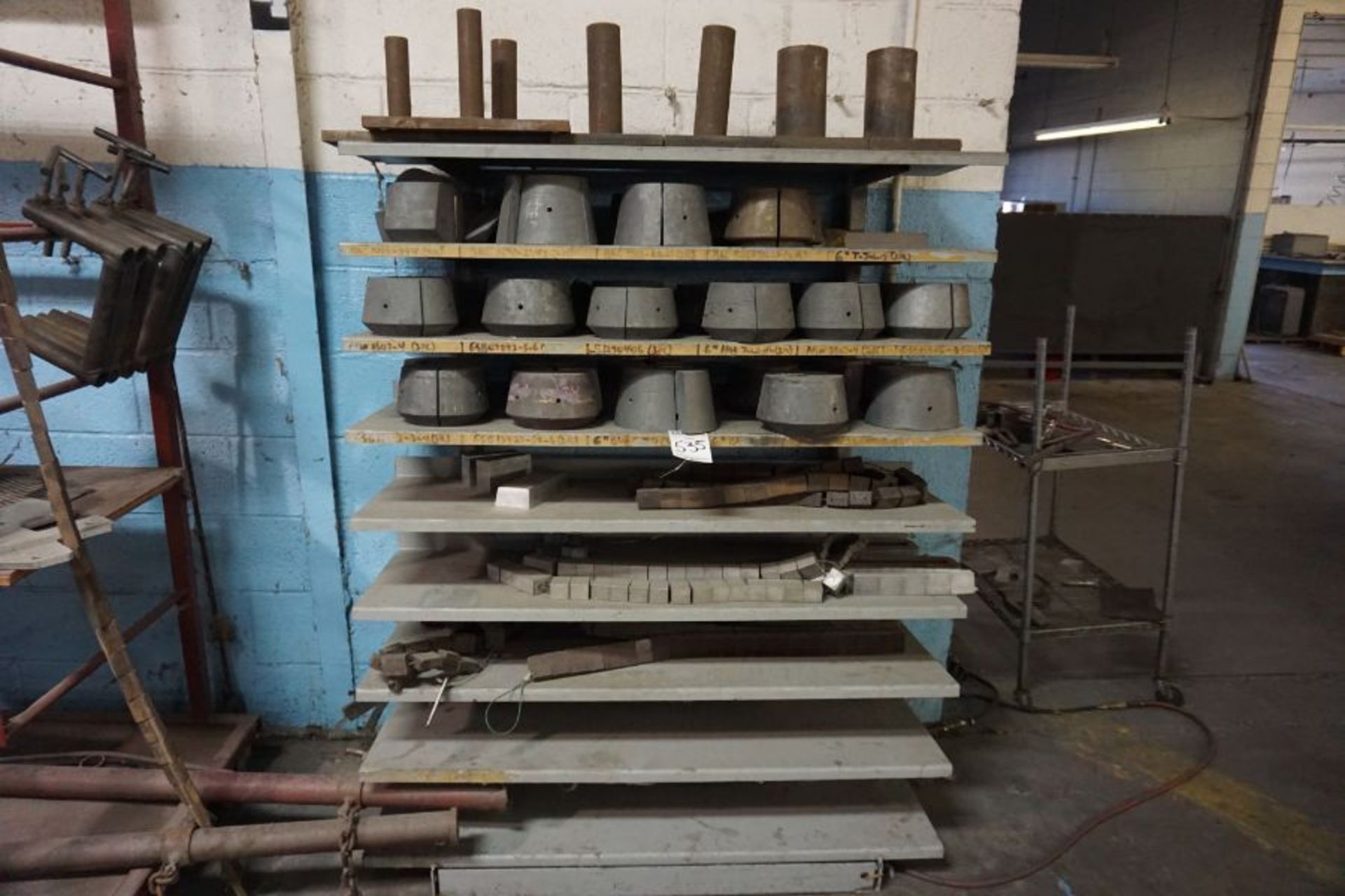 (2) Racks of Assorted Spanding Chucks for Versa Stretchformer *Auctioned from Edgerton, KS*