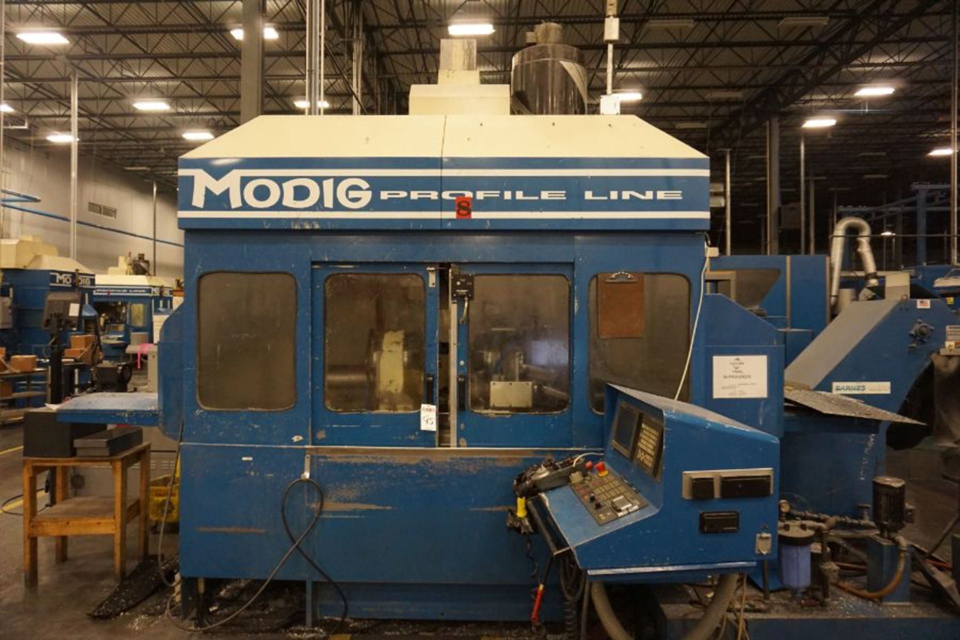 Modig MD7200, Fanuc 16M, 20K RPM, 24 ATC, CT40, s/n 970362, New 1997