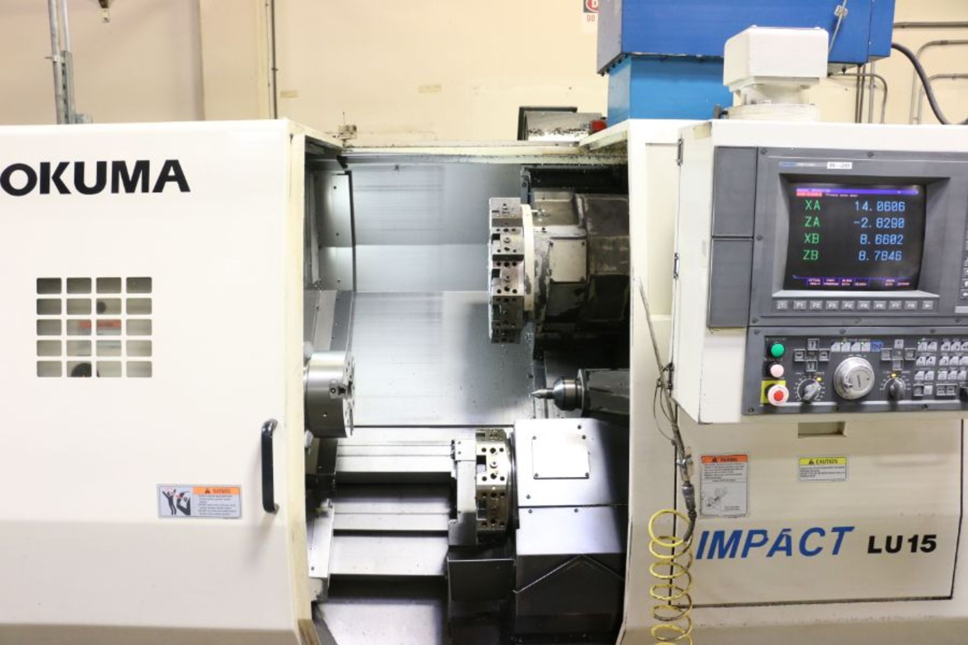 Okuma Impact LU-15 4-Axis, OSP-UI00L control, 10" 3 Jaw Chuck, 12 Position Upper & 8 Position - Image 6 of 12