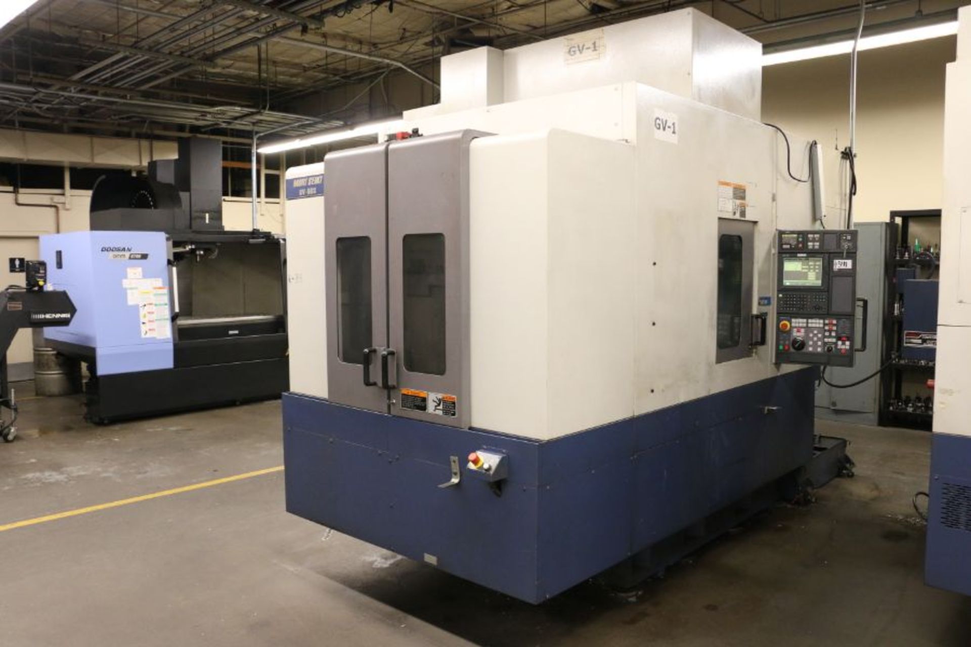 Mori-Seiki GV-503 4-Axis, MSG-803 Control, APC, 24” x 20” x 18”, 30 ATC, CTS, s/n: 9, New 1999