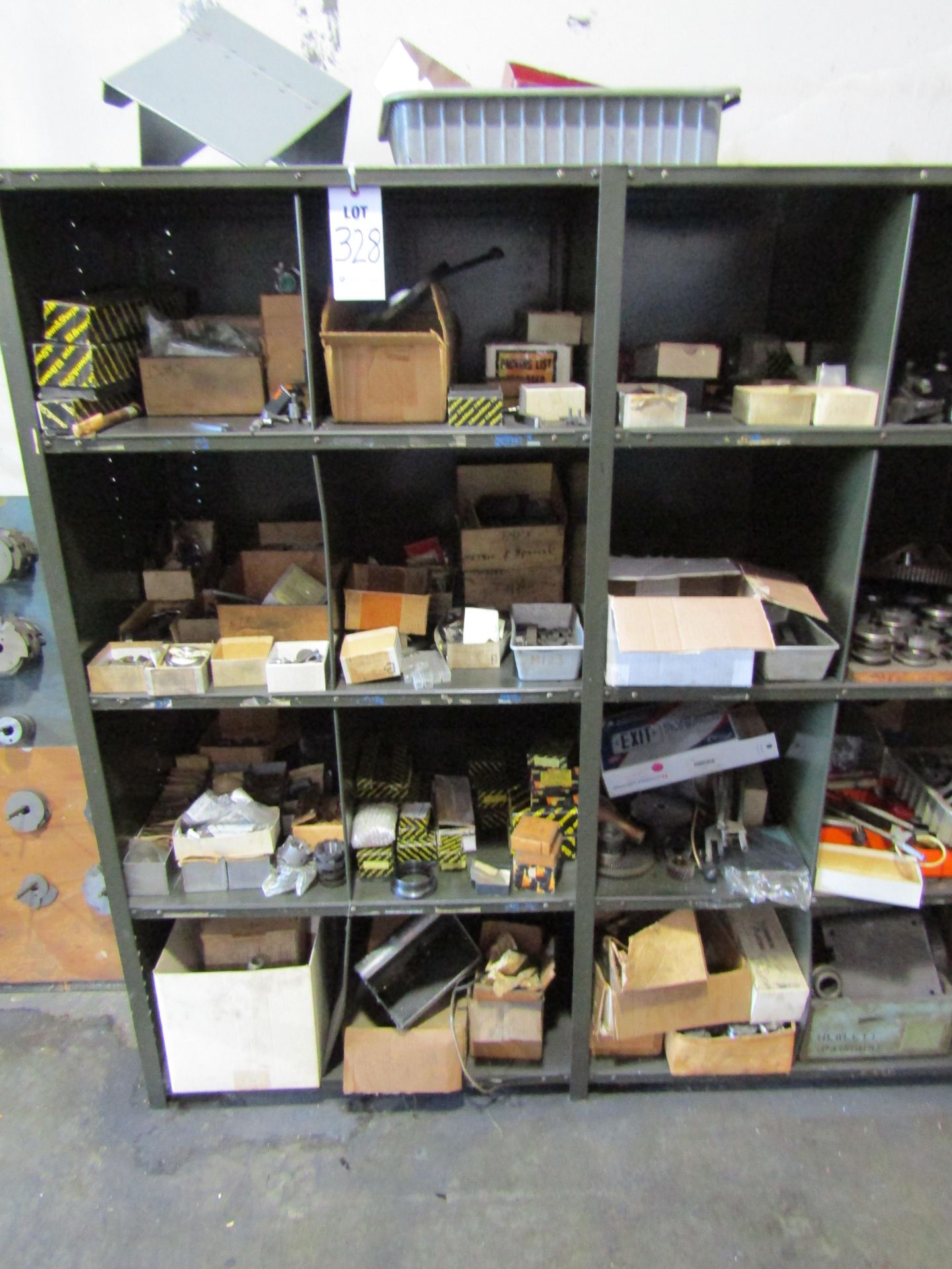 (12) CUBBIES OF SHELVING TO INCLUDE BUT NOT LIMITED TO: BROWNE & SHARPE SPARE PARTS, CUTTING