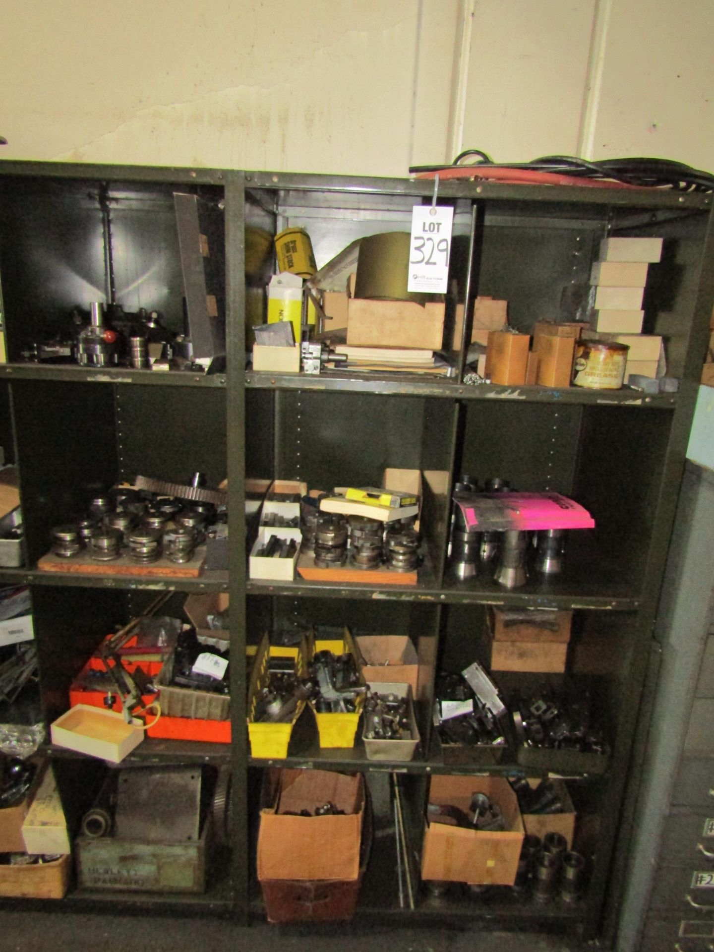 (12) CUBBIES OF SHELVING TO INCLUDE BUT NOT LIMITED TO: TOOL HOLDERS, DIE HEADS, BROWNE & SHARPE