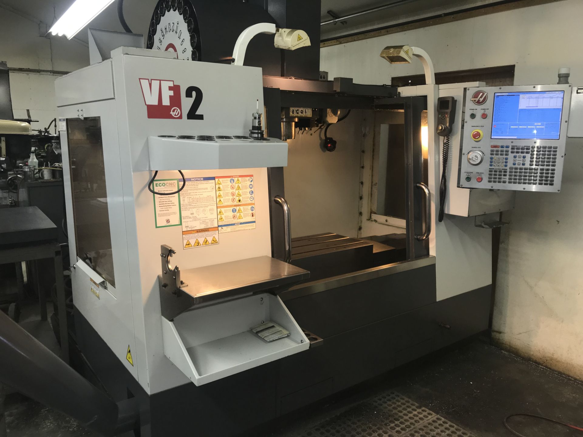 2010 HAAS VF-2, 20 HP, 10K SPINDLE, 1200 IPM RAPID, 24 TOOL SMTC, 4TH AXIS READY, WIPS, CHIP