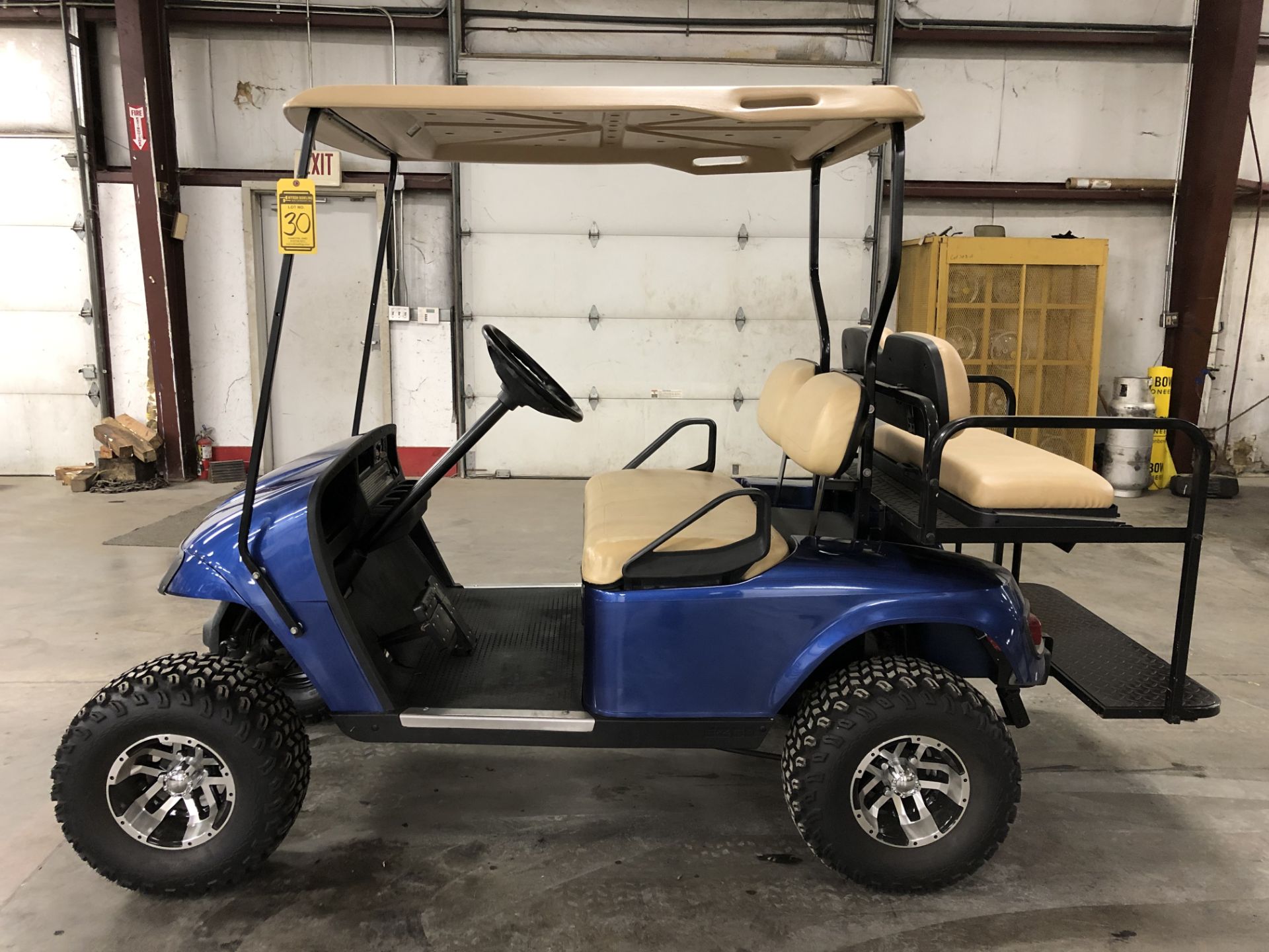 2010 EZ-GO PDS ELECTRIC GOLF CART, WITH 36 VOLT CHARGER, 4-PASSENGER FOLD DOWN SEAT, LIFT KIT,