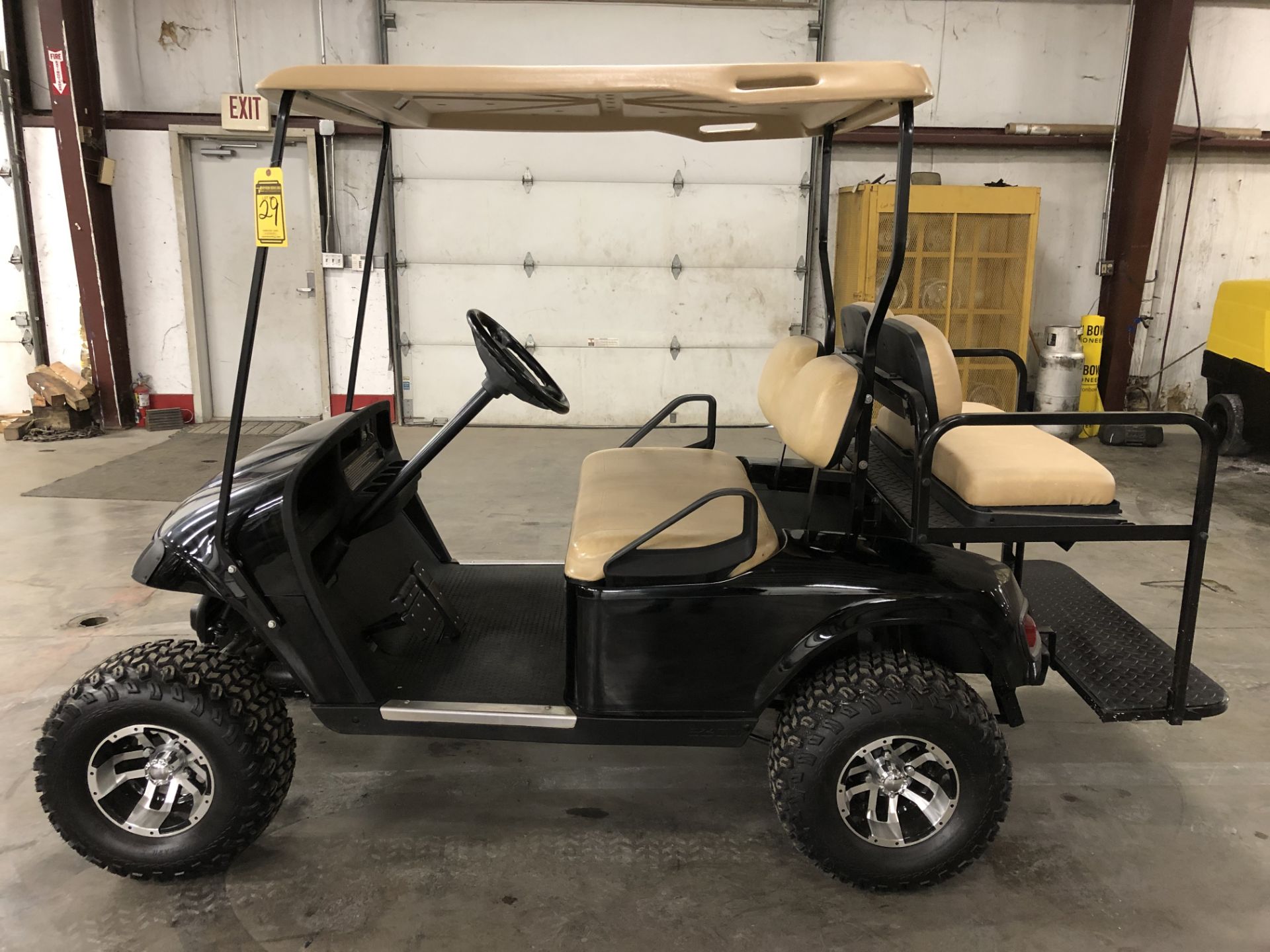 2010 EZ-GO PDS ELECTRIC GOLF CART, WITH 36 VOLT CHARGER, 4-PASSENGER FOLD DOWN SEAT, LIFT KIT,