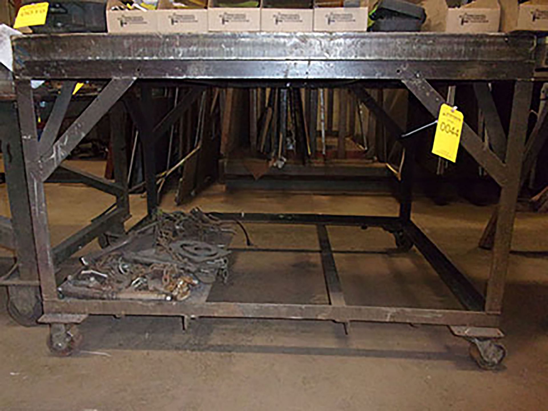 STEEL TABLE ON WHEEL; 5'L X 4'W X 3' 5''T