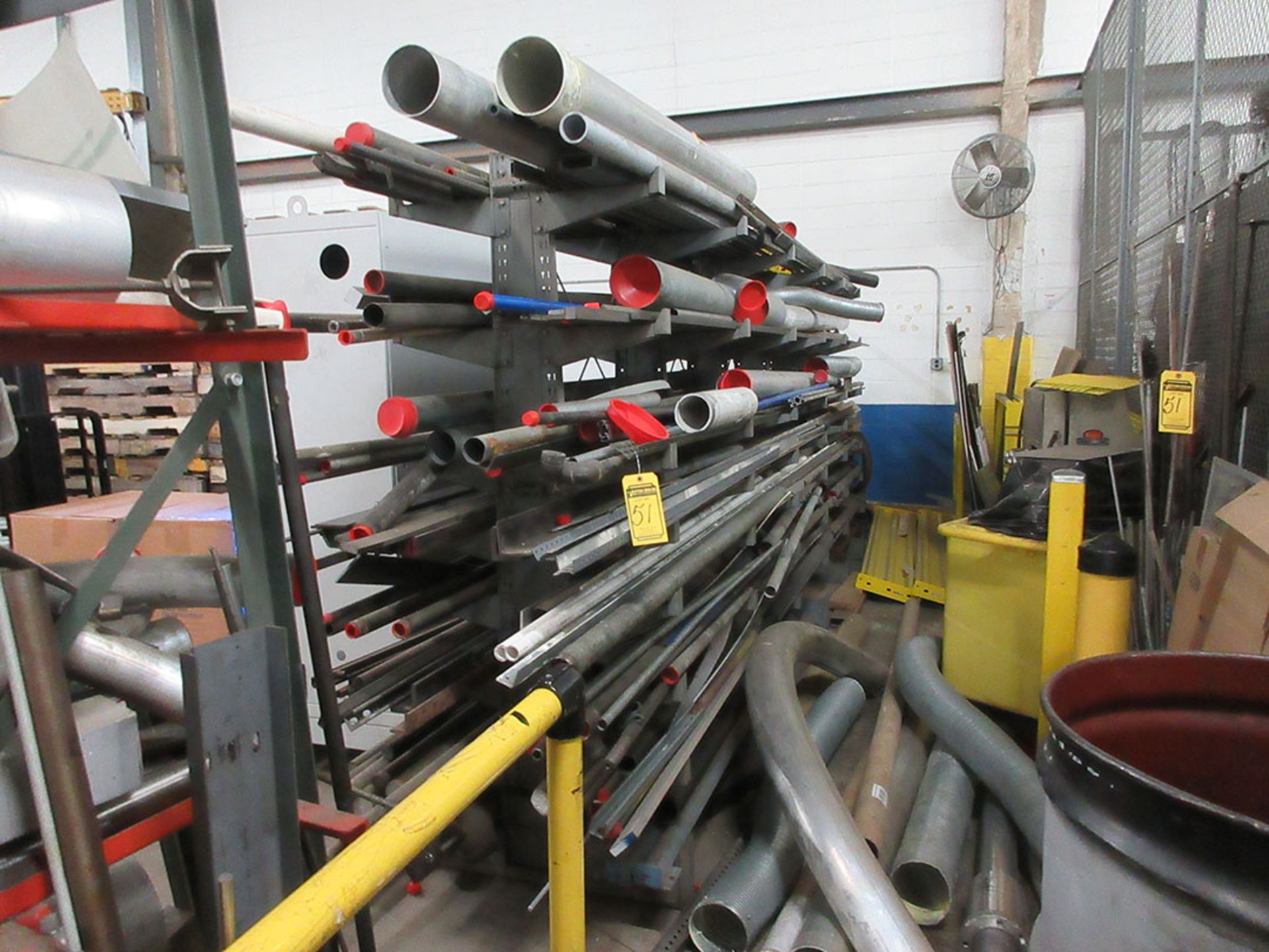 DOUBLE SIDED CANTILEVER RACK WITH CONTENTS; PIPE, ALL THREAD, AND ANGLE IRON