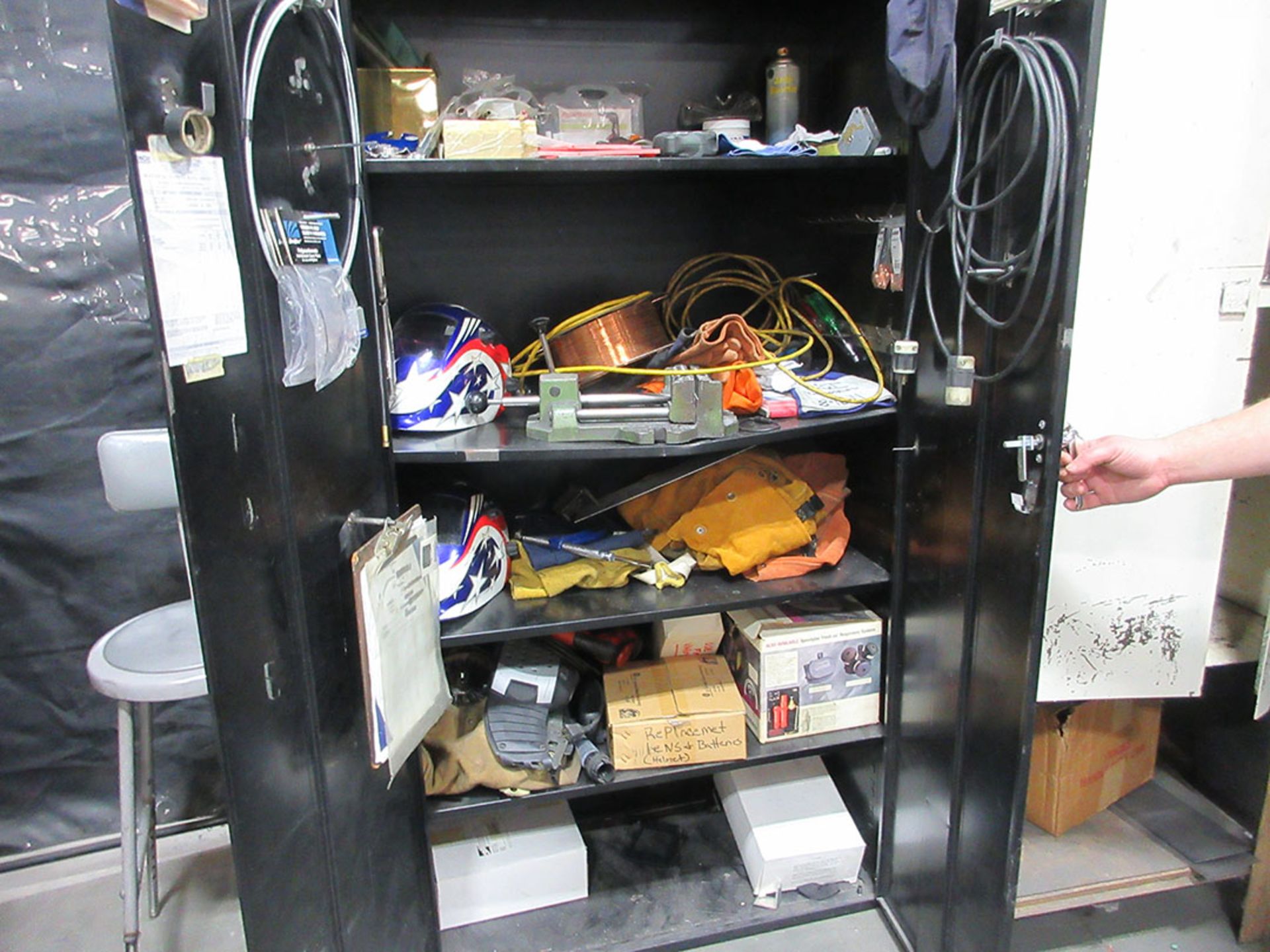 (2) 2-DOOR CABINETS WITH CONTENTS; WELDING WIRE, HELMETS, LEATHERS, AND ACCESSORIES