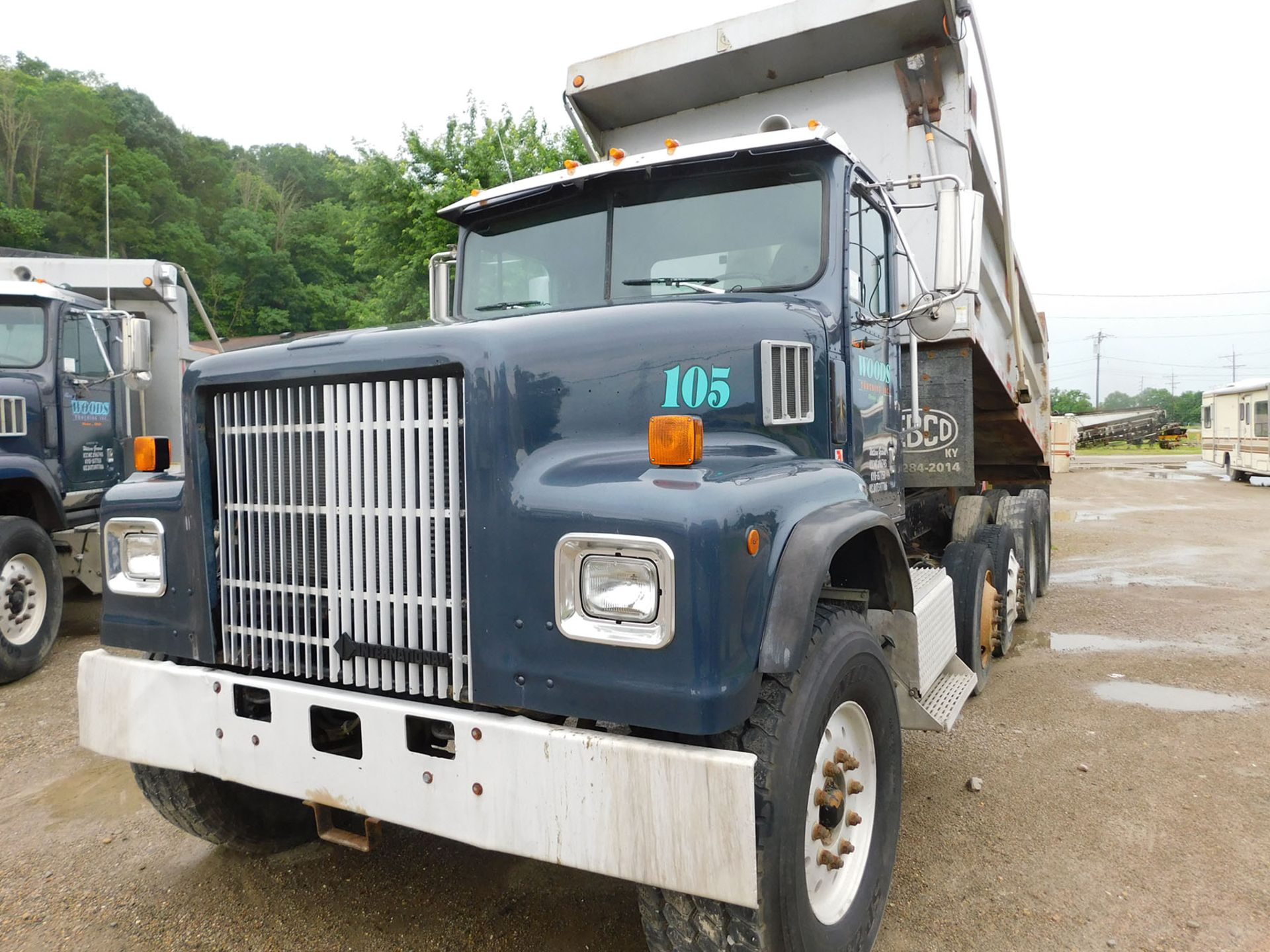 1997 PAYSTAR DUMP TRUCK; CUMMINS M11, ROADRANGER 8-SPEED TRANSMISSION WITH DEEP REDUCTION, QUAD