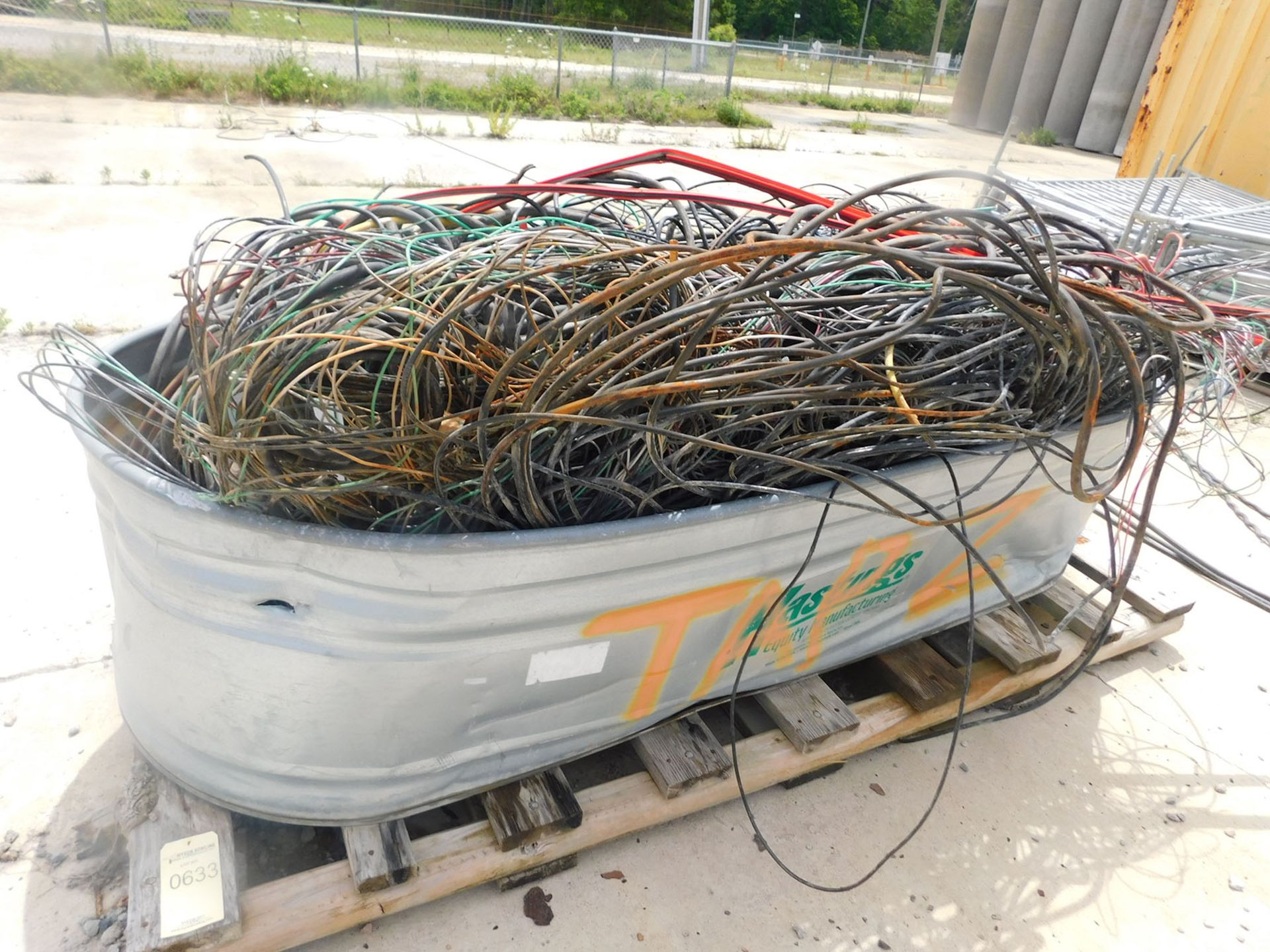 WATER TROUGH FULL OF SCRAP COPPER