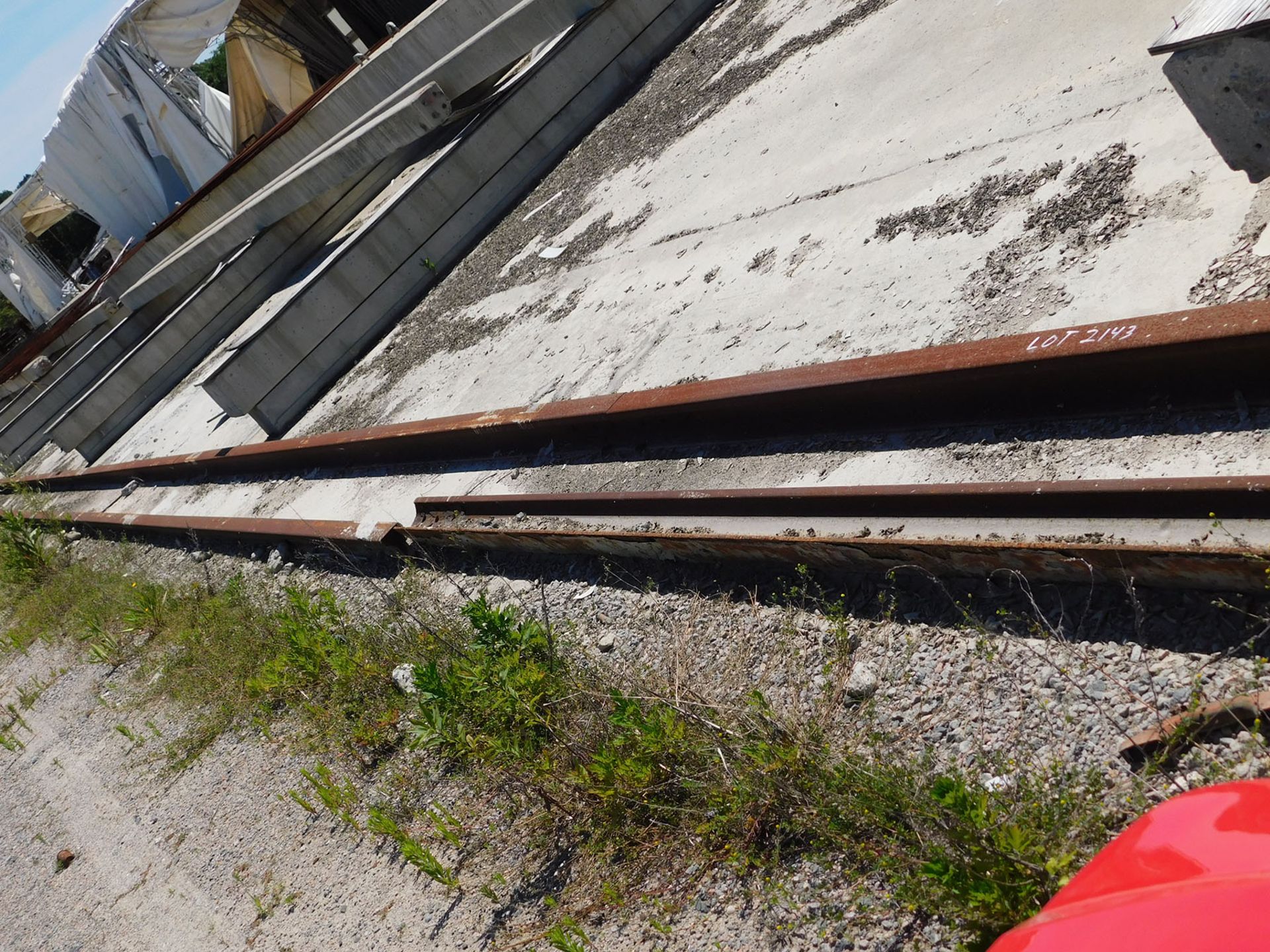 APPROX. 110' OF STEEL TRACK WITH ROLLER STANDS