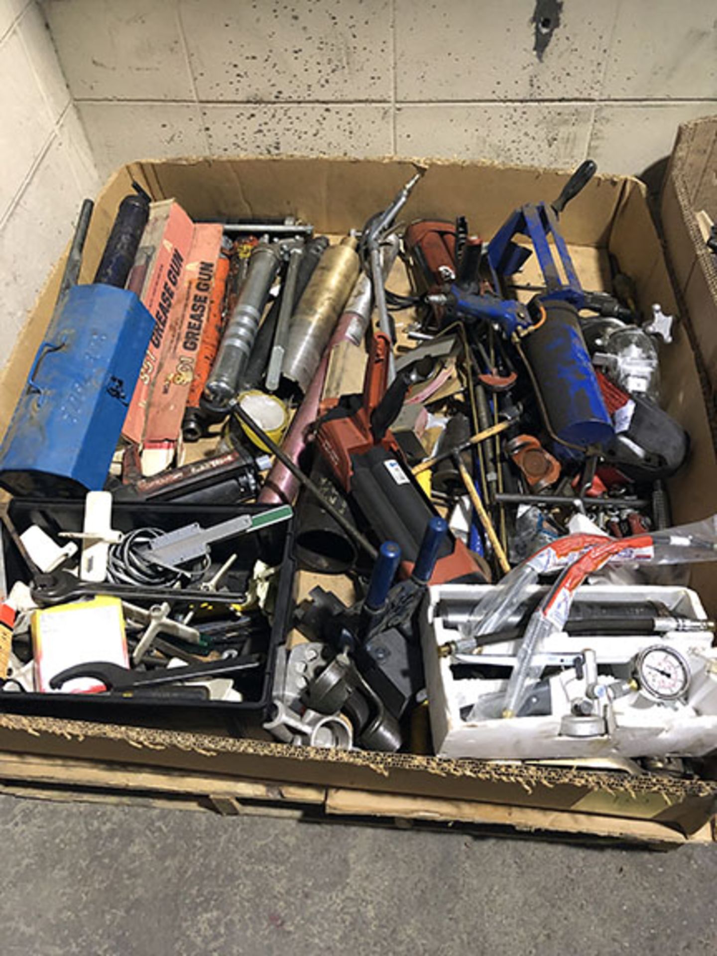 LARGE ASSORTMENT OF GREASE GUNS, HILTI MIX GUNS, EXPANDER WRENCHES, CLAMPS AND MISC.