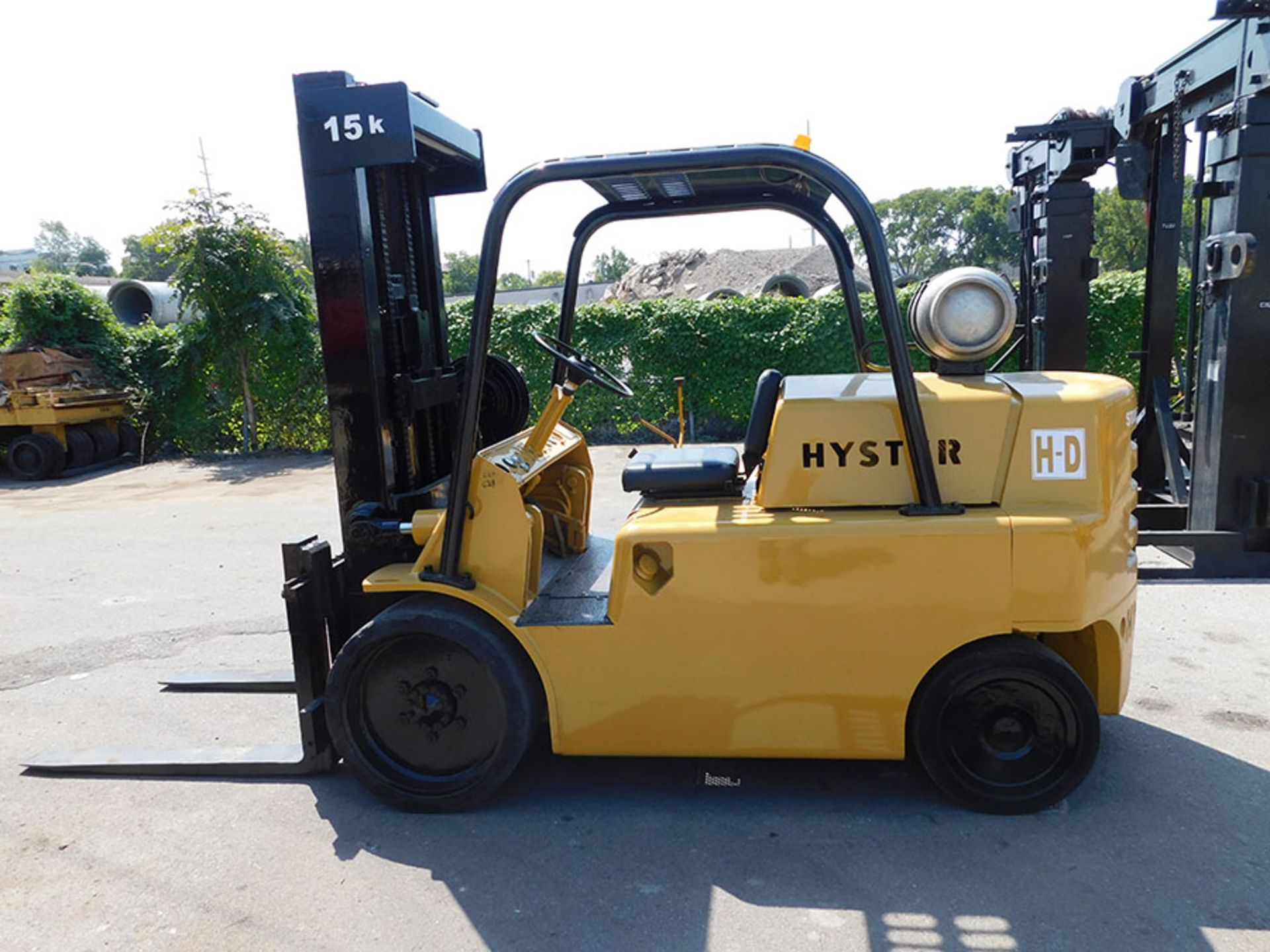 HYSTER S150A 14,400 LB. FORKLIFT; 3-STAGE MAST, 220'' LIFT HEIGHT, LP GAS, SOLID TIRES, 46''