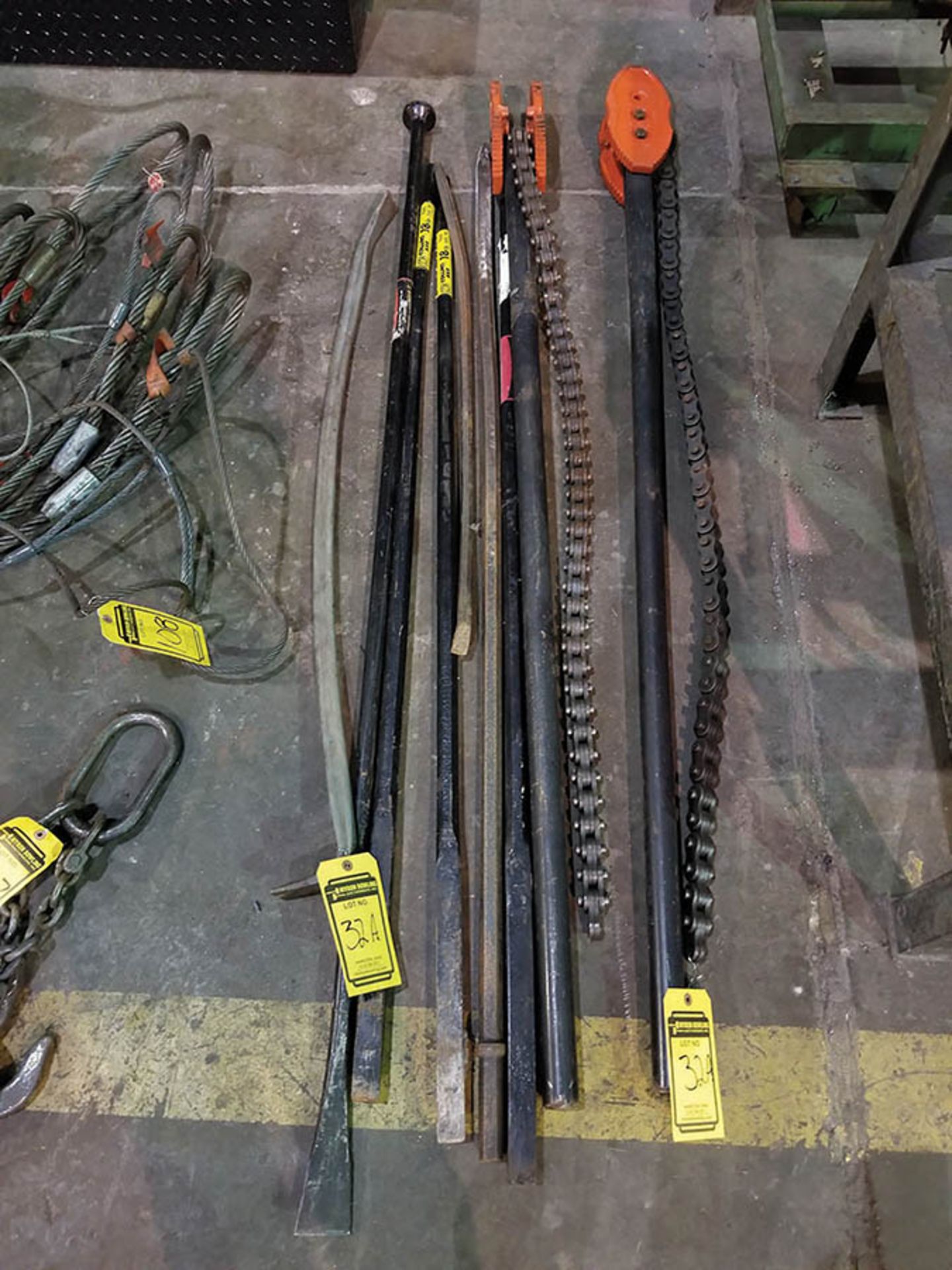 (2) RIGID MANUAL PIPE HOLDERS, PRY & TAMPING BARS, AND LARGE CROW BAR