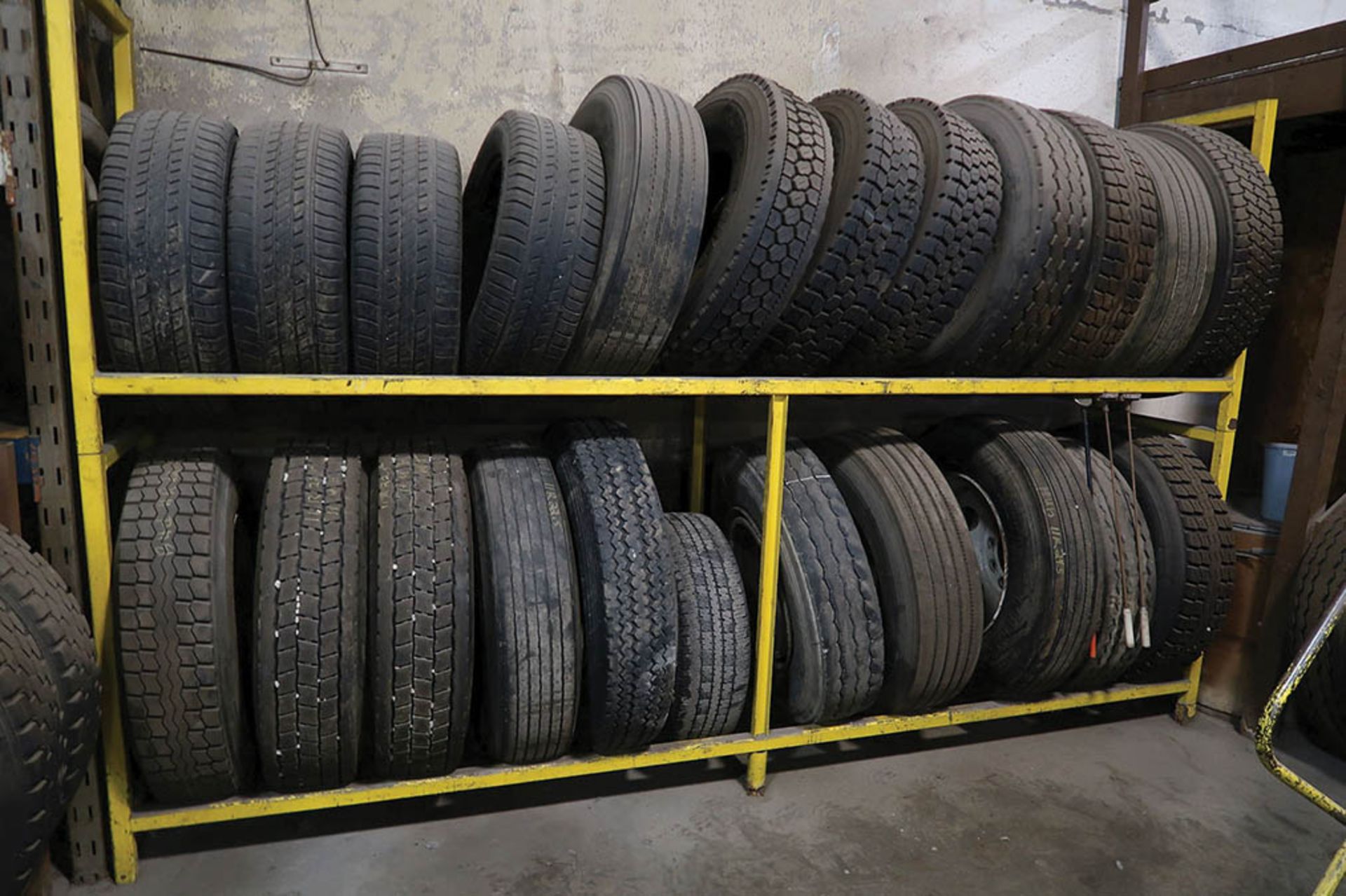 (LOT) MISC. CAR AND TRUCK TIRES WITH RACKS ***LOCATED IN MIDLAND, MICHIGAN** - Image 3 of 4