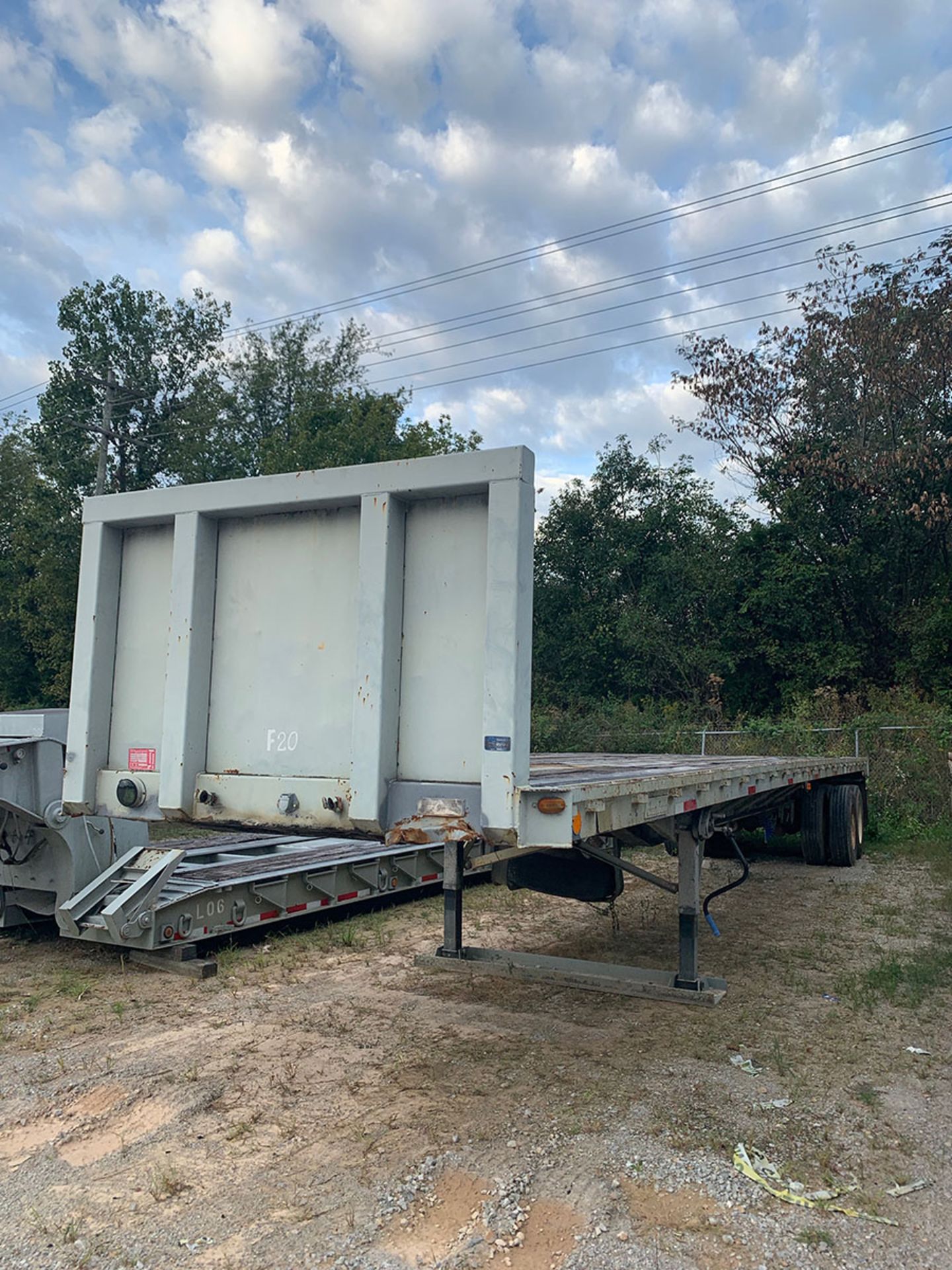 GREAT DANE 48' FLATBED TRAILER WITH HEADACHE RACK, T/A, WOOD DECK, AIR RIDE SUSPENSION