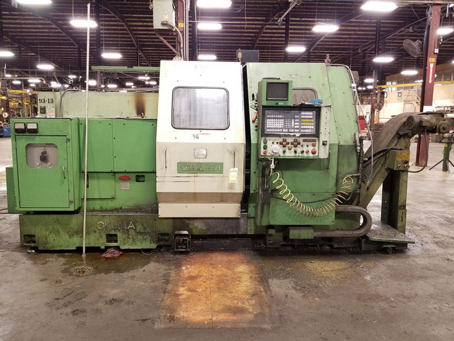 OKUMA LC-30 CNC LATHE, S/N 0319, 8 & 7-TOOL POSITION TURRETS, OUTFEED CHIP CONVEYOR