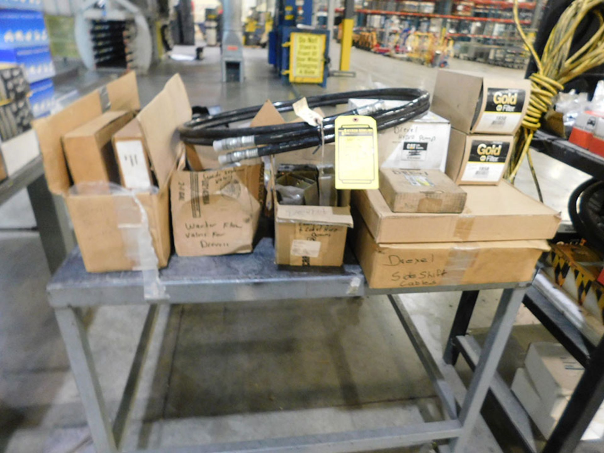 ROLLING TABLE WITH ASSORTMENT OF DREXEL FORKLIFT PARTS
