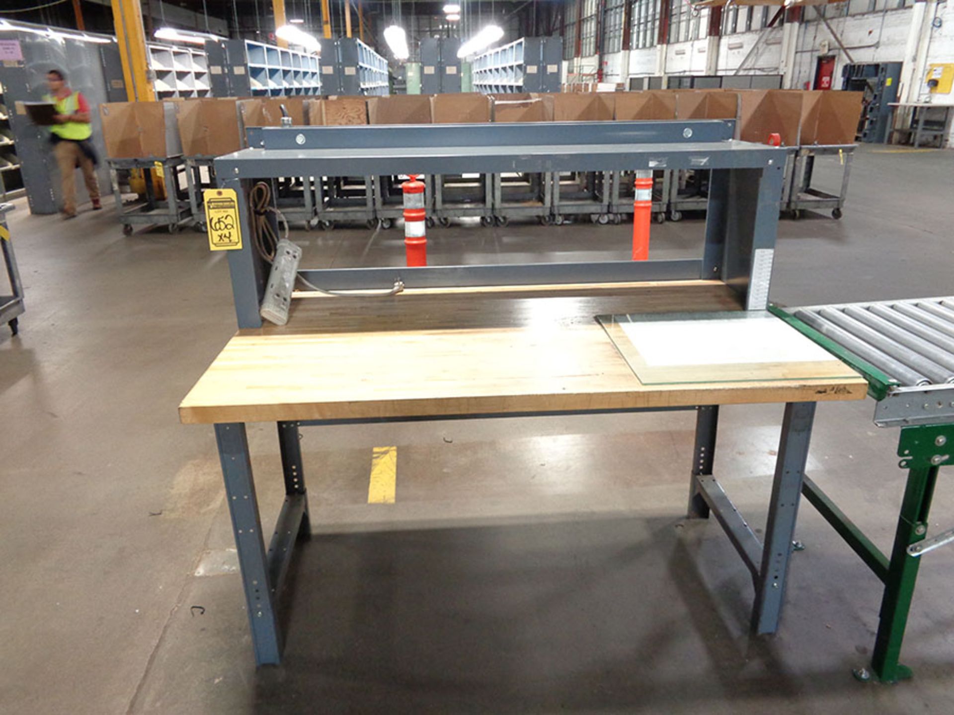 (4) WOOD TOP WORKBENCHES WITH 110V OUTLETS