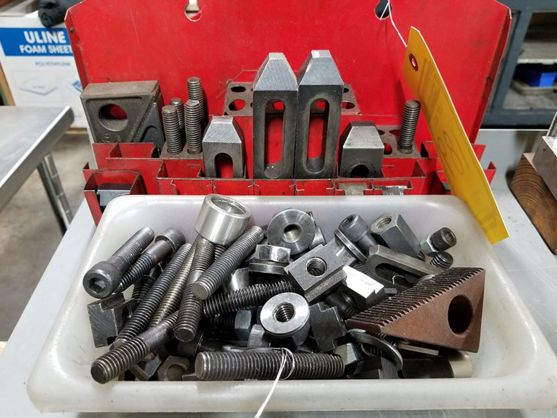 PARTIAL HOLDDOWN SET WITH SET HOLDER AND BIN OF HOLDDOWN PARTS