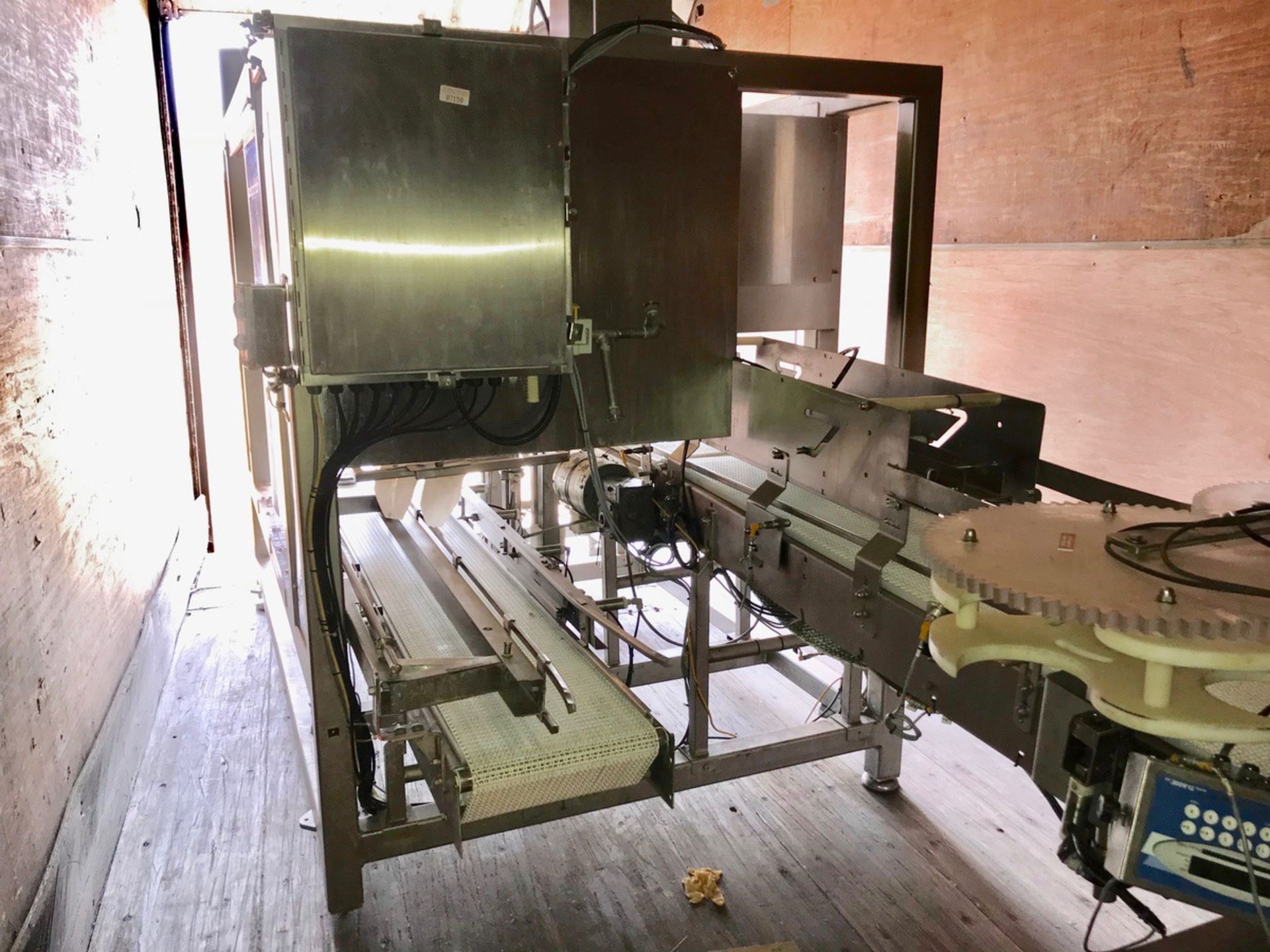 Integrated Packaging Machinery Stainless Steel Case Packer with Allen Br | Loc: LKY | Rig Fee: $450