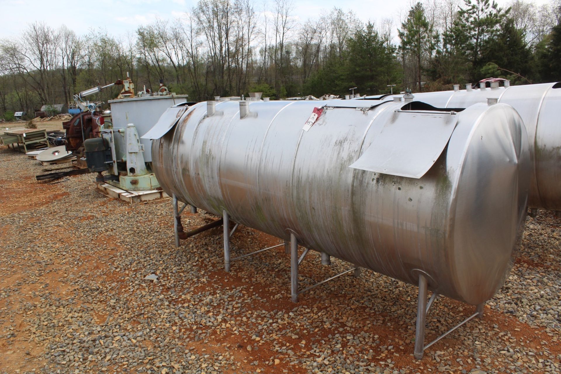 600 gallon Stainless milk tank - 11 ft 8 in l x 3.5" d | Load Fee: $5