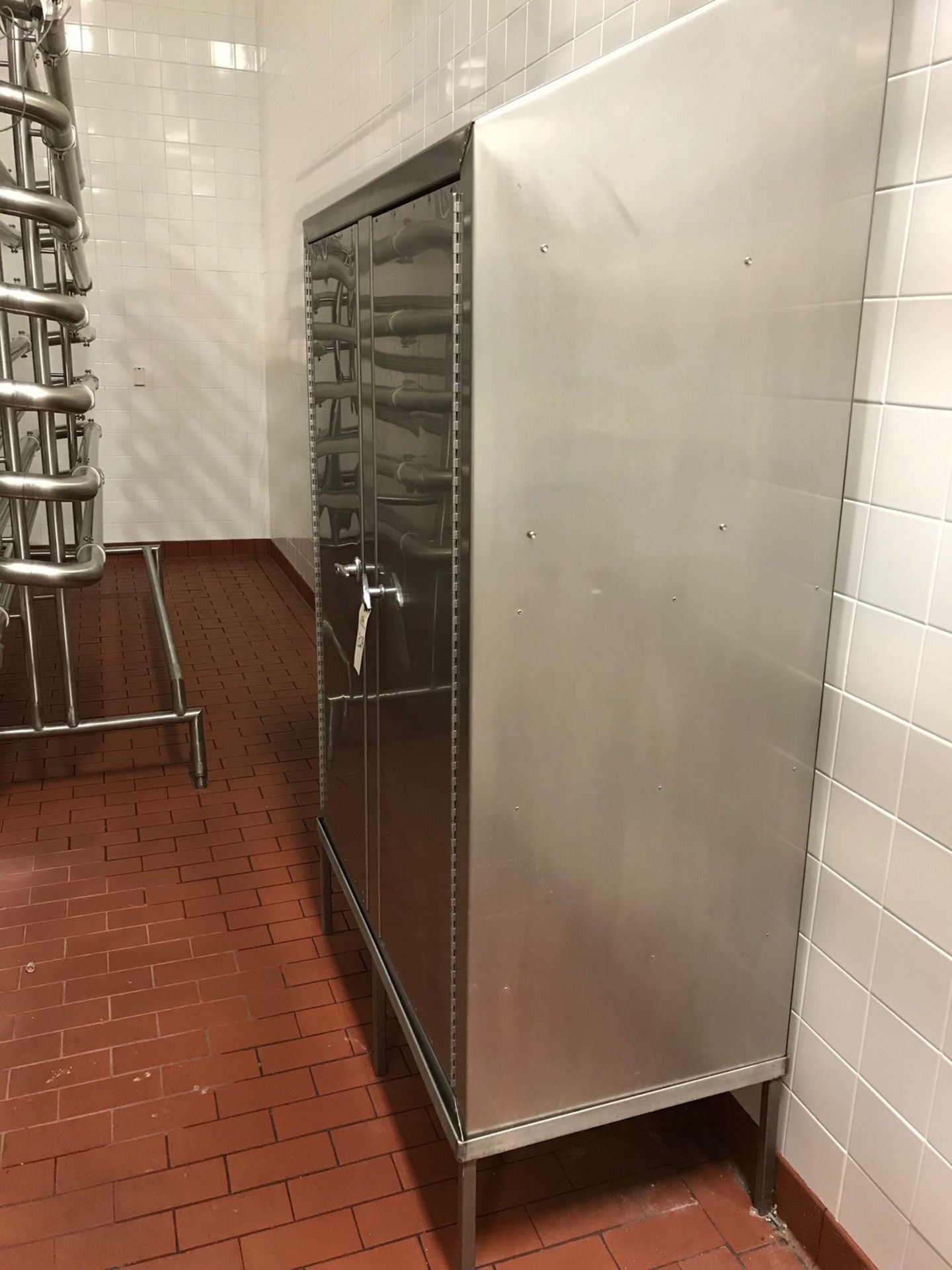 Stainless Steel 2-Door Cabinet, 4ft x 5in x 2ft Deep | Rig Fee: $100