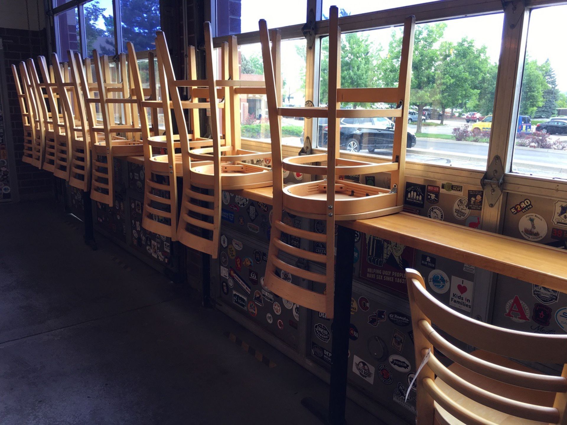 (10) Wooden Barstools and Window Tables | Rig Fee: $75