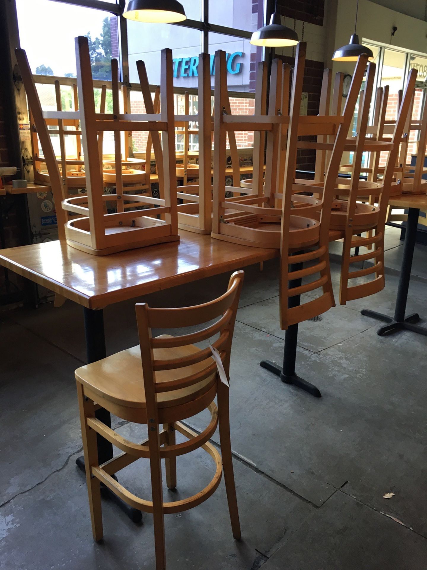 (2) 6-Top Tables, Bar Height, (12) Chairs | Rig Fee: $125