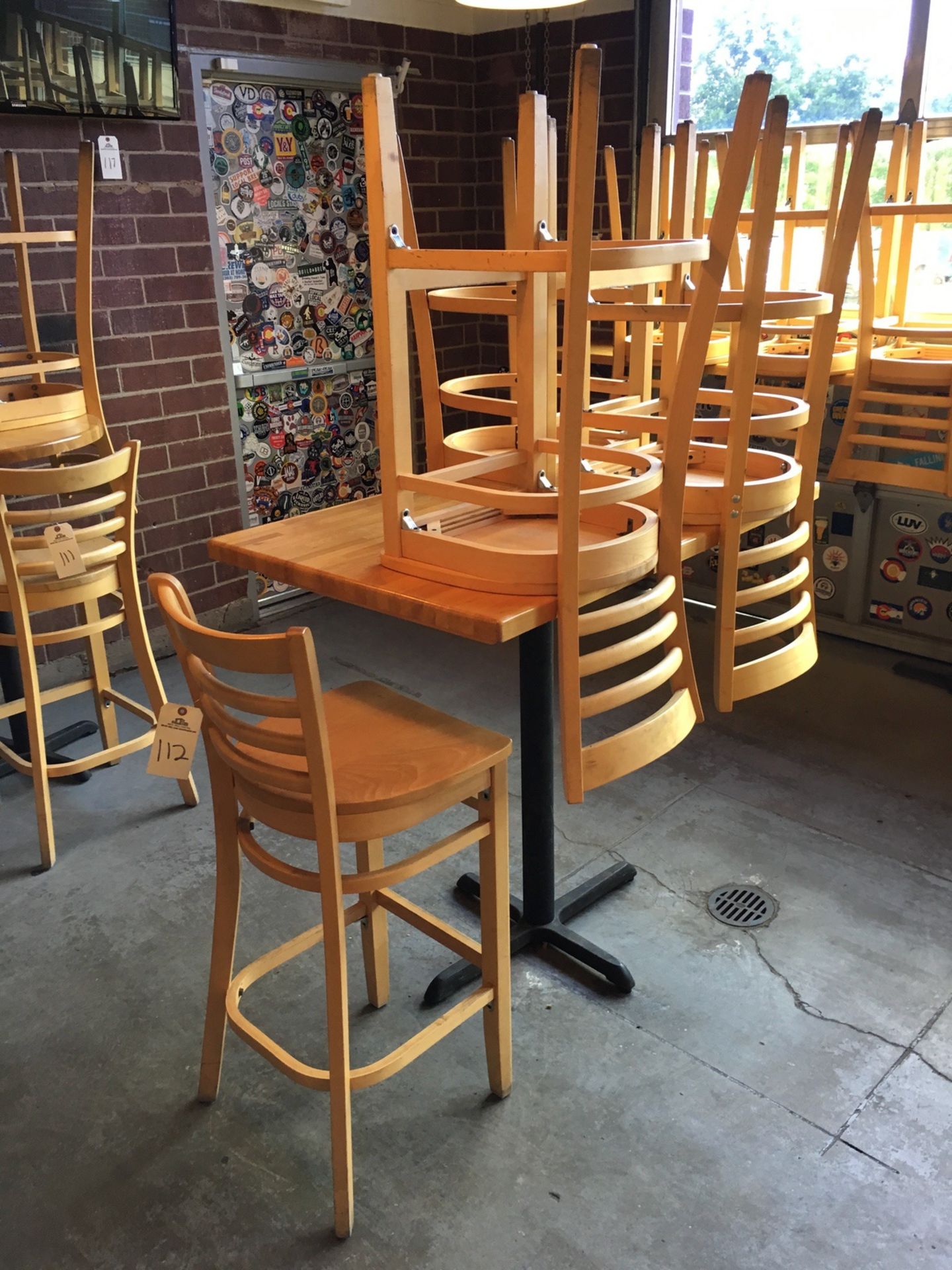 (2) 4-Top Tables, Bar Height, (8) Chairs, (1) 4-Chair Standard Height Table and Cha | Rig Fee: $125