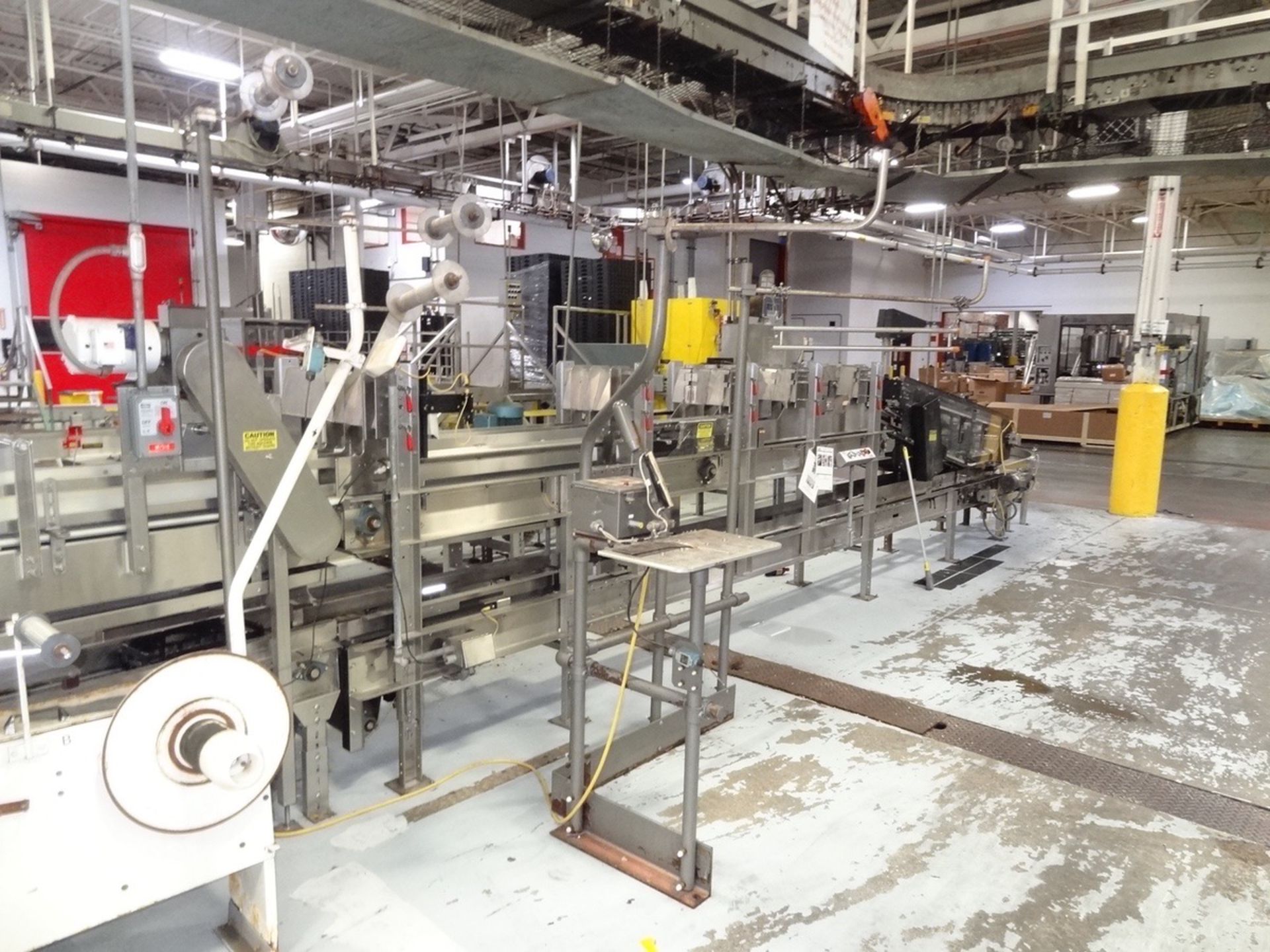 Hartness Model 2600 Continuous Motion Case Packer, Allen-Bradley SLC 5/04 | Loc: IN | Rig Fee: $750